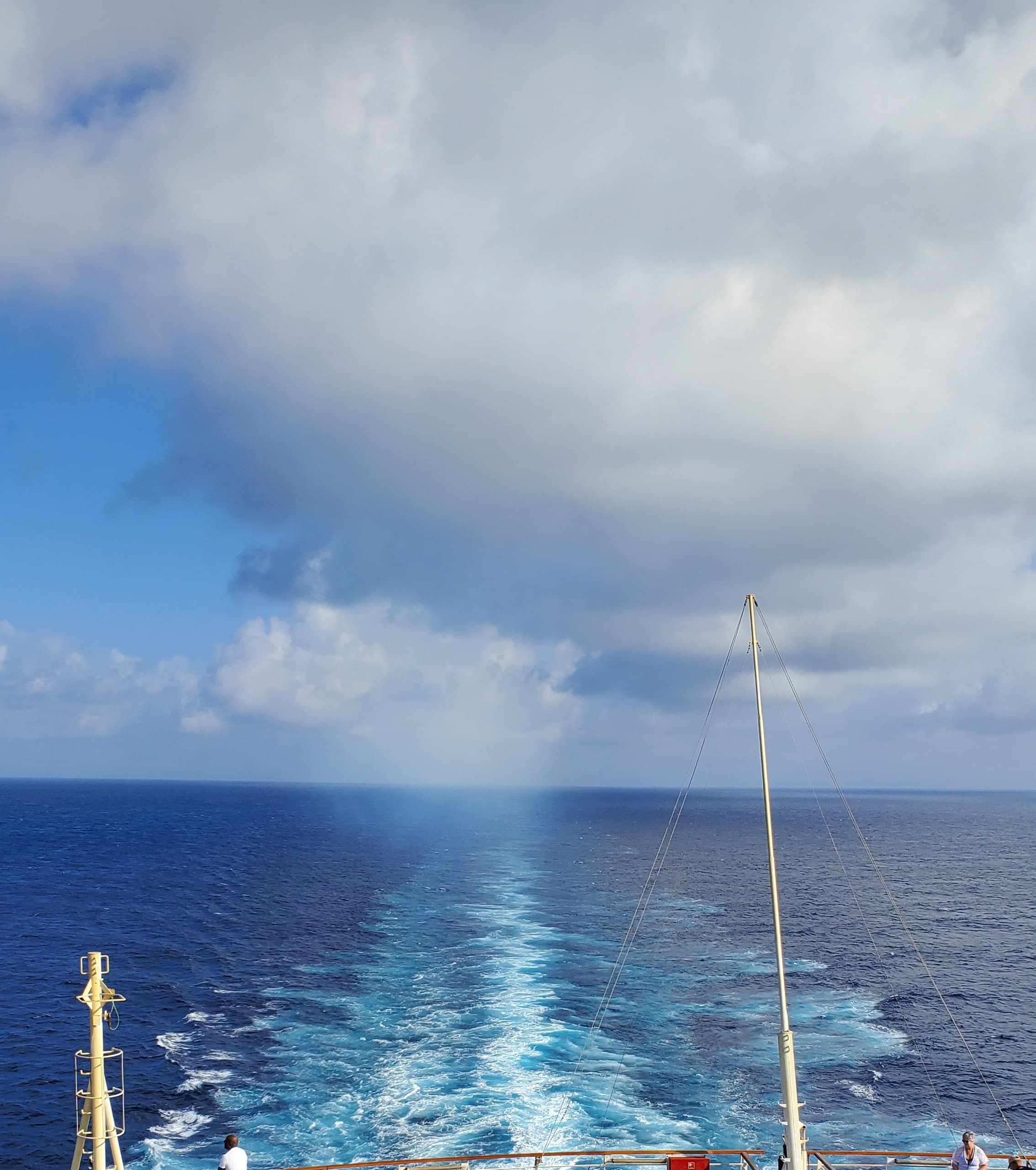 View of waves in the sea by a boat