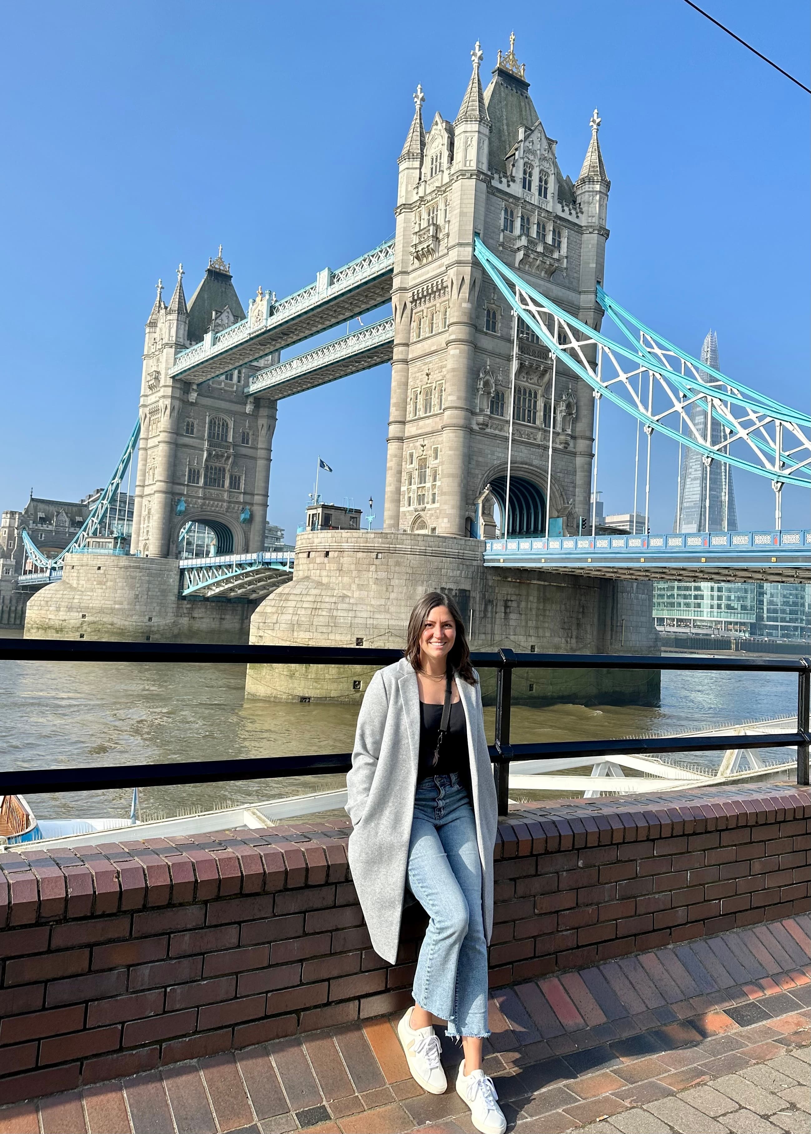 Travel advisor Kati Vervack in front of bridge