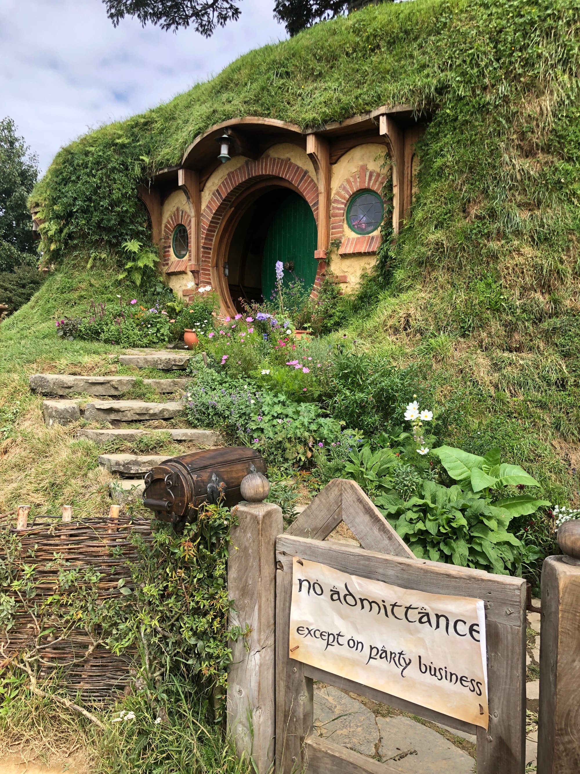 A little cabin in a green hill.