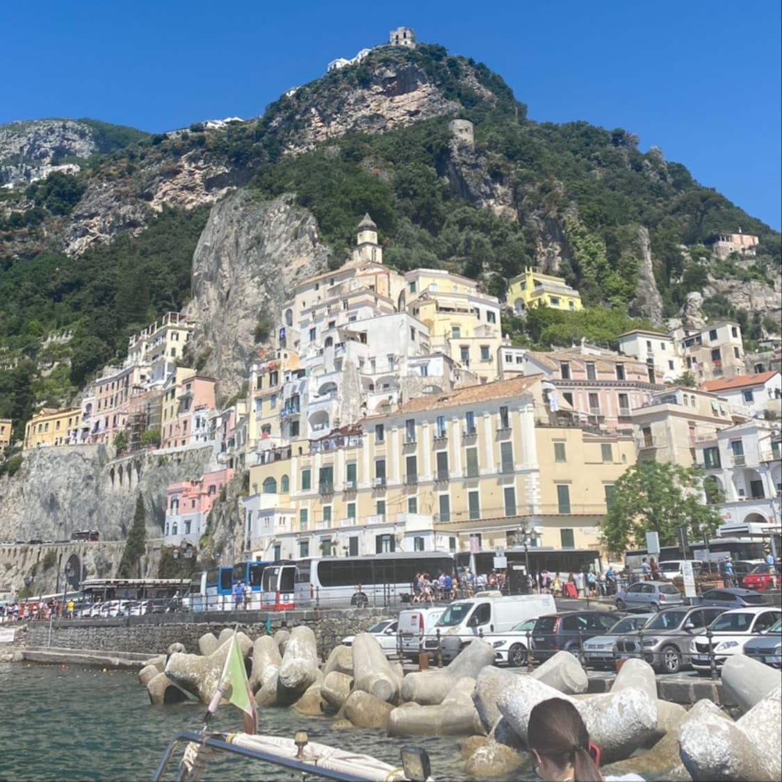 Travel Advisor Kiana Grant's photo of structures by the mountain and sea