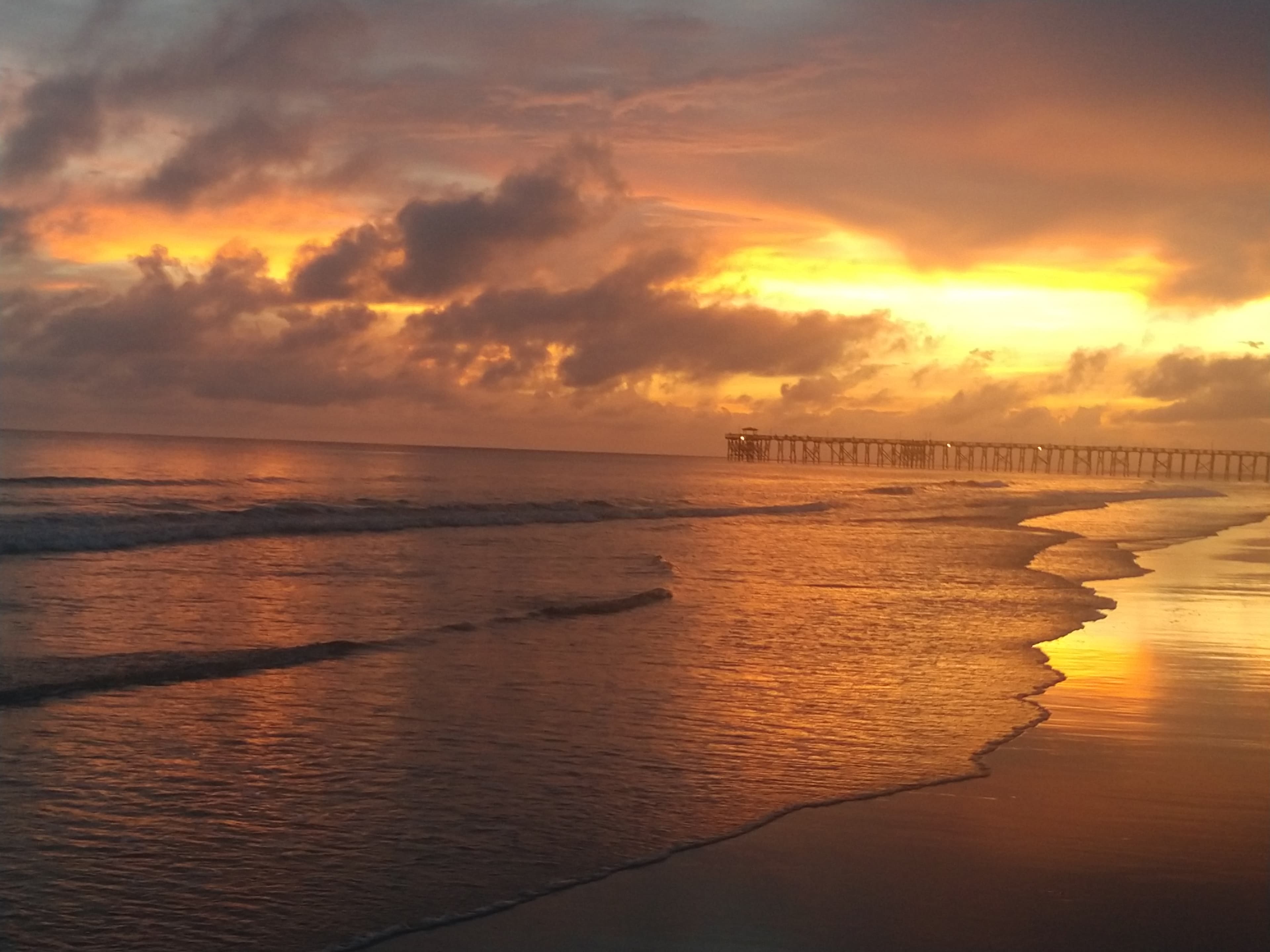 A beautiful view of sea at sunset