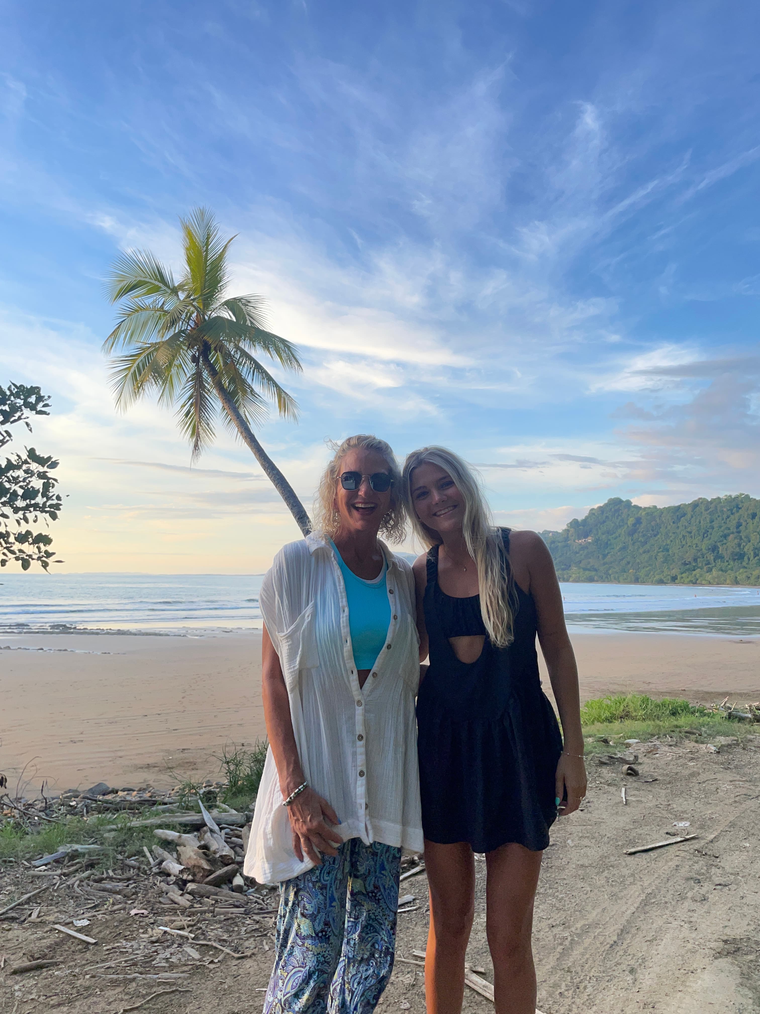Picture of Tracy with friend on a beach