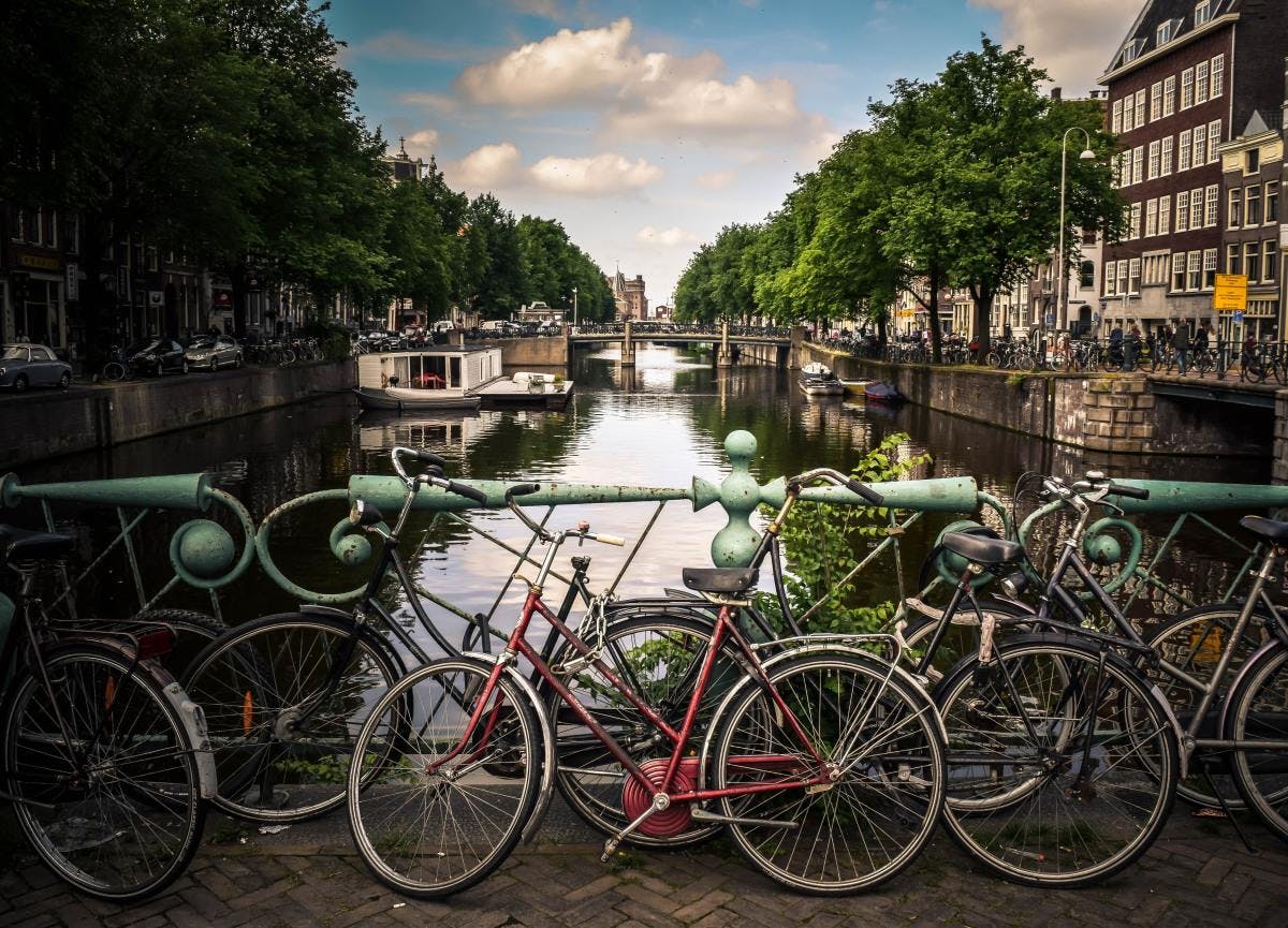 bicycles on a bridge over an Amsterdam canal 