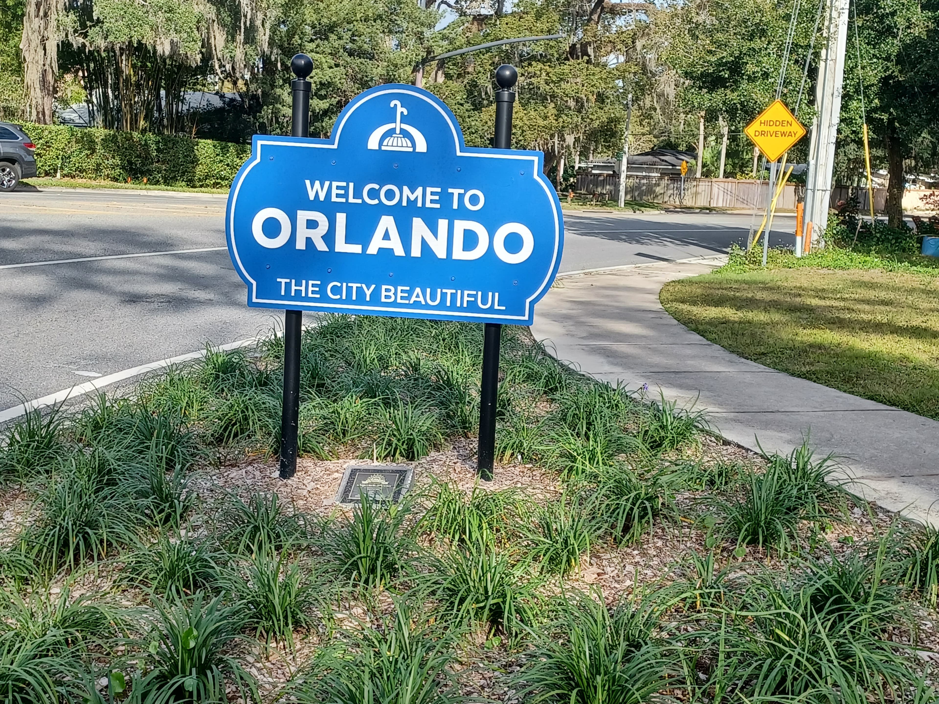 An Orlando sign board on the road