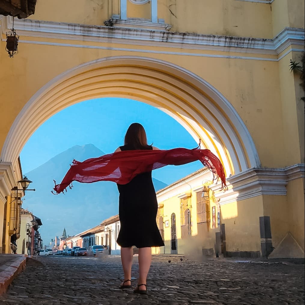 Adviser Pam Hughet taking picture in the street