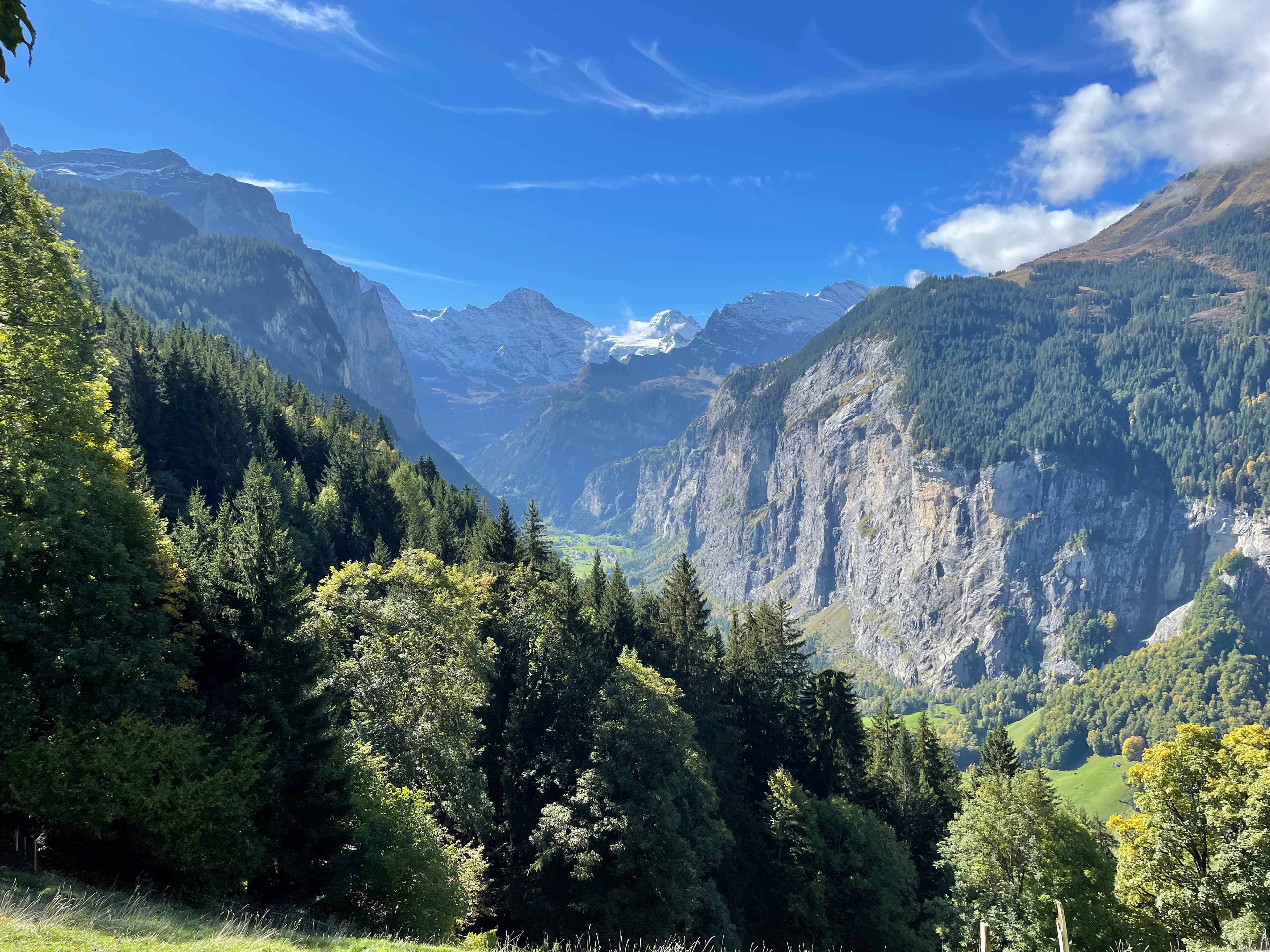 A scenic view of rocks under blude sky.