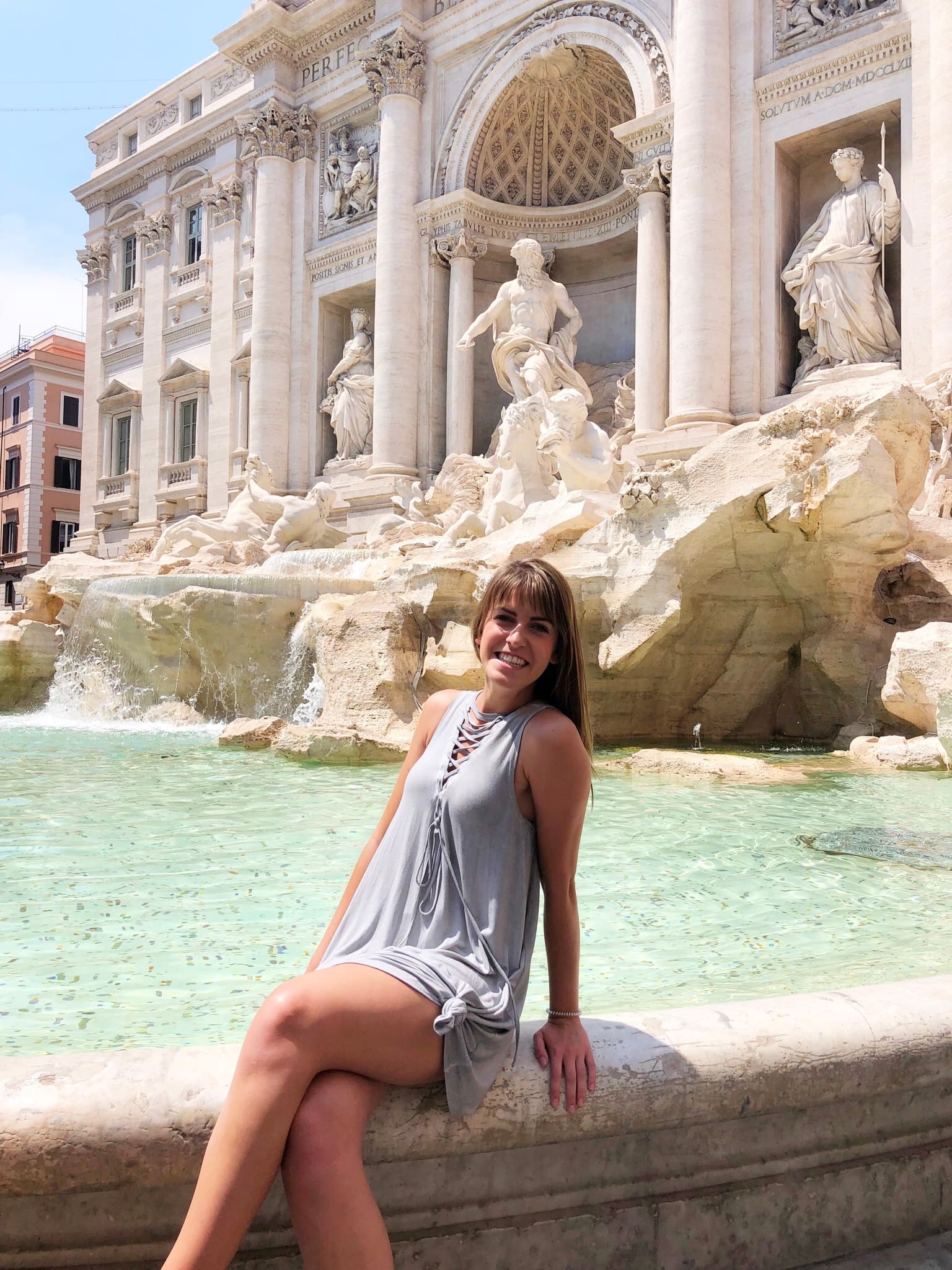 Picture of Morgan at Trevi Fountain on a sunny day