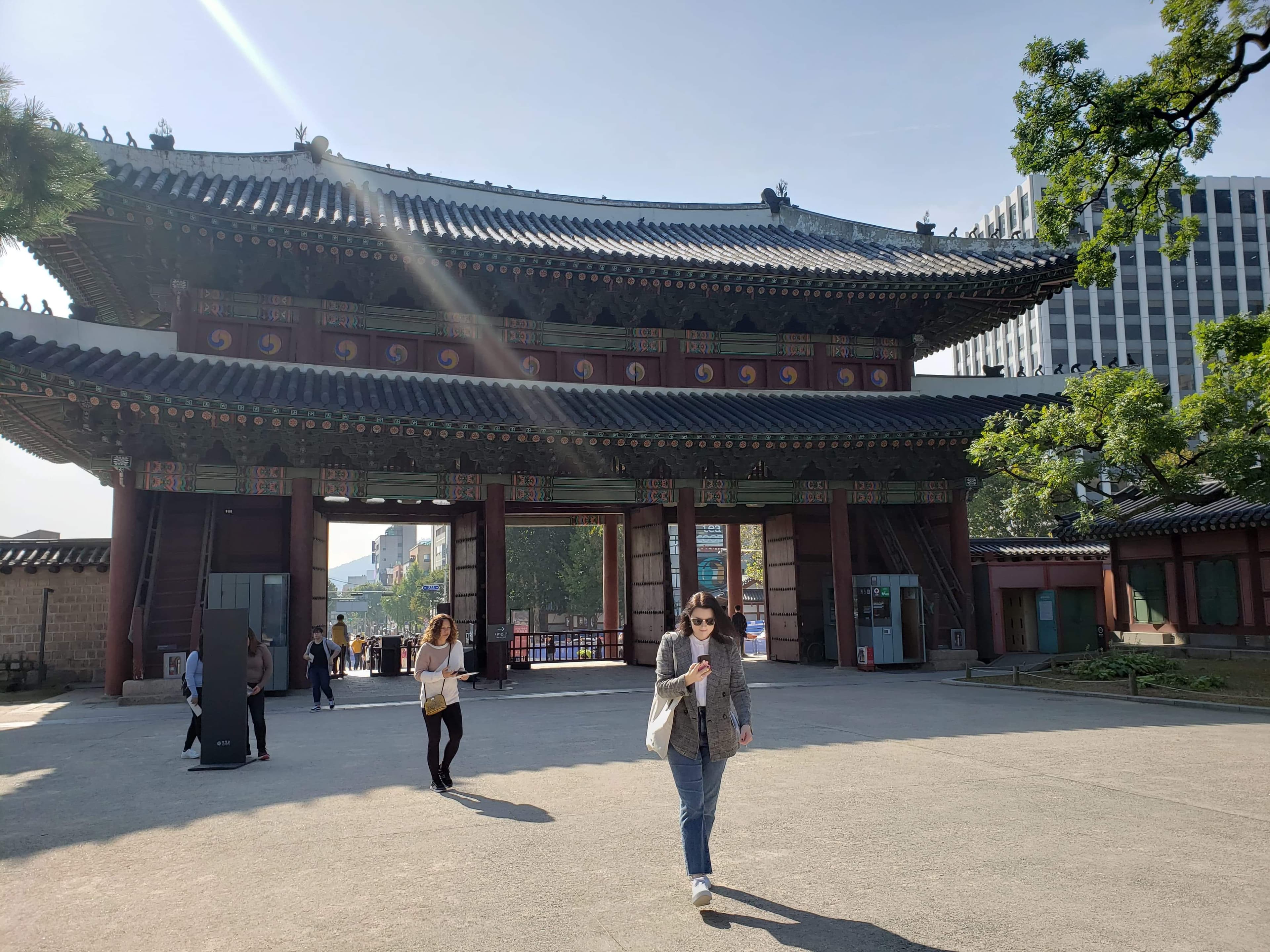 Posing for a photo at Donhwamun Gate