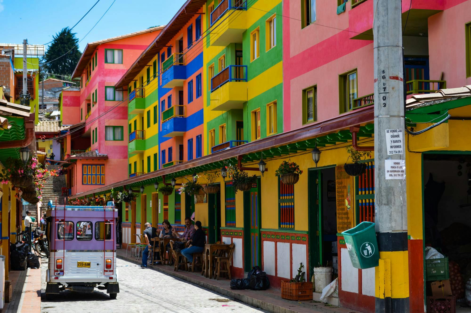 Colorful Colombia street with a trolly car