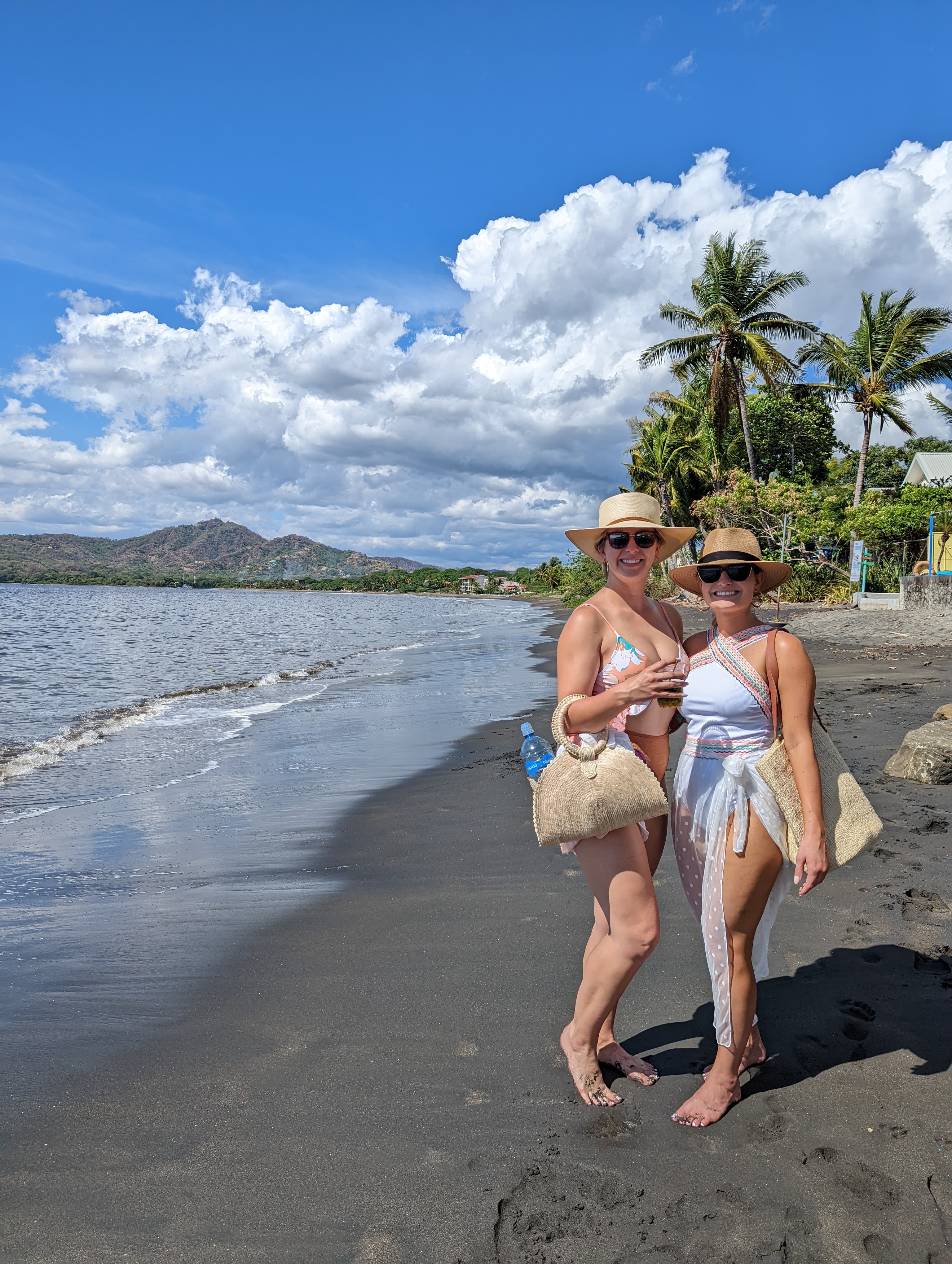 Travel advisor posing on a sea side