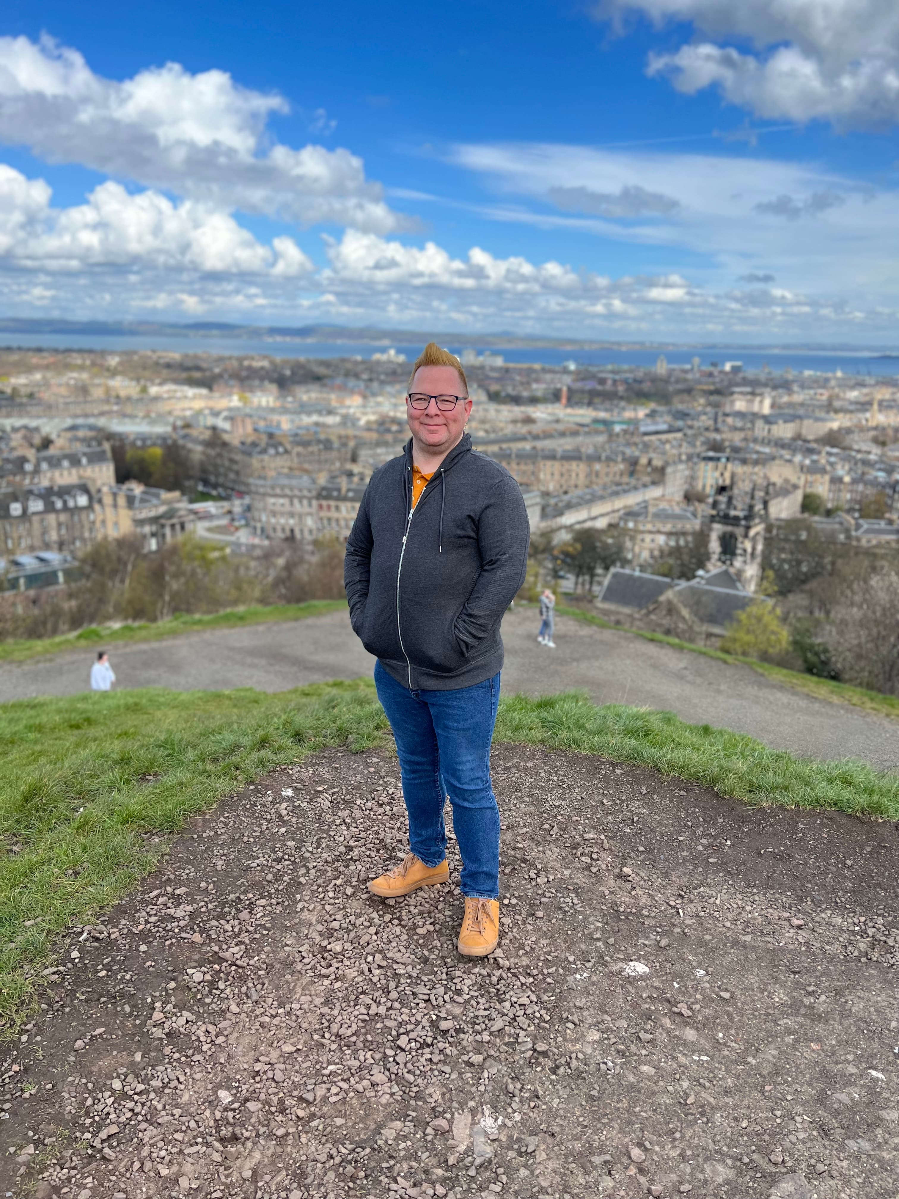 Posing for a photo with city view