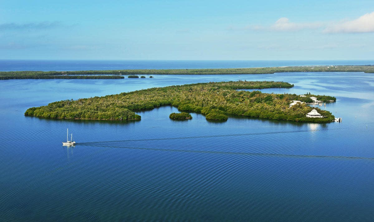 An aerial view of an island in the daytime.