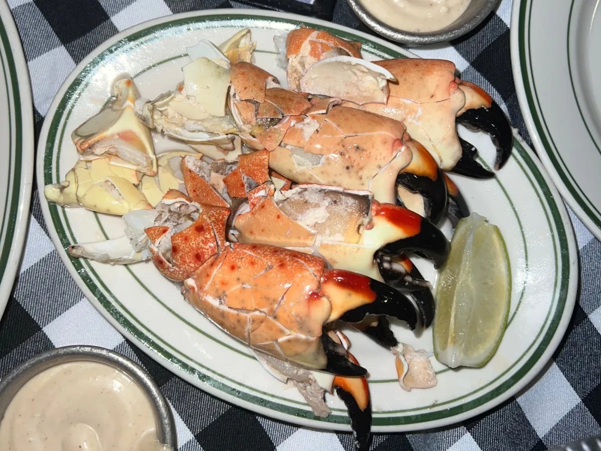 A plate with cooked lobsters served on a table in a restaurant. 