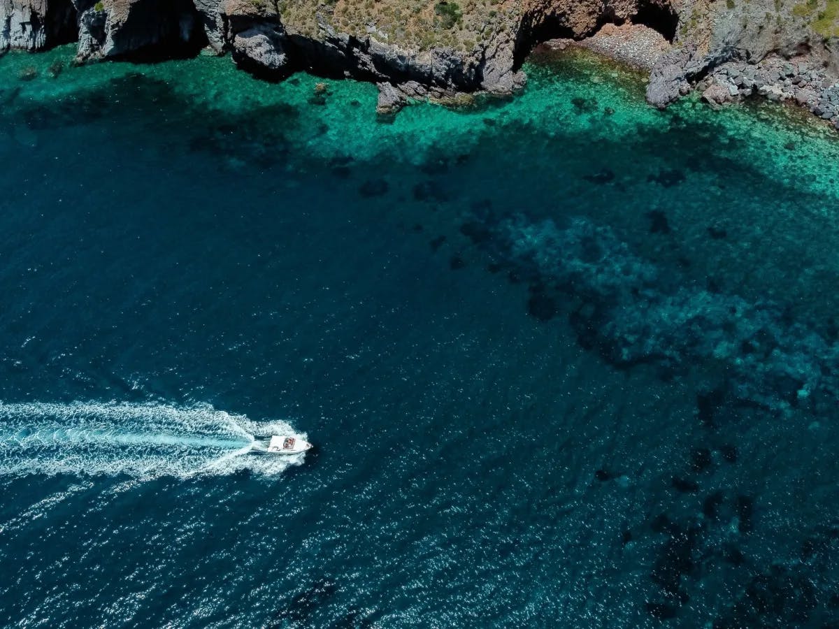 Aerial view of boat on water.