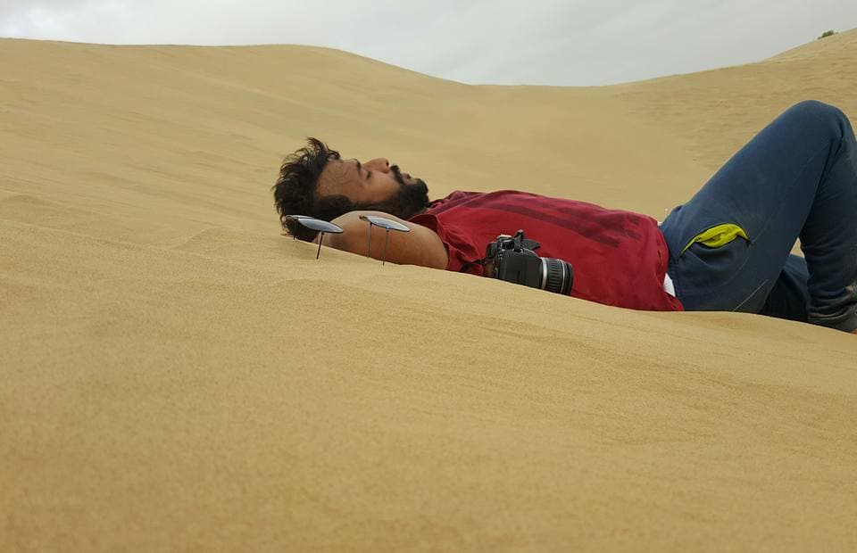 Lying down on the desert sand