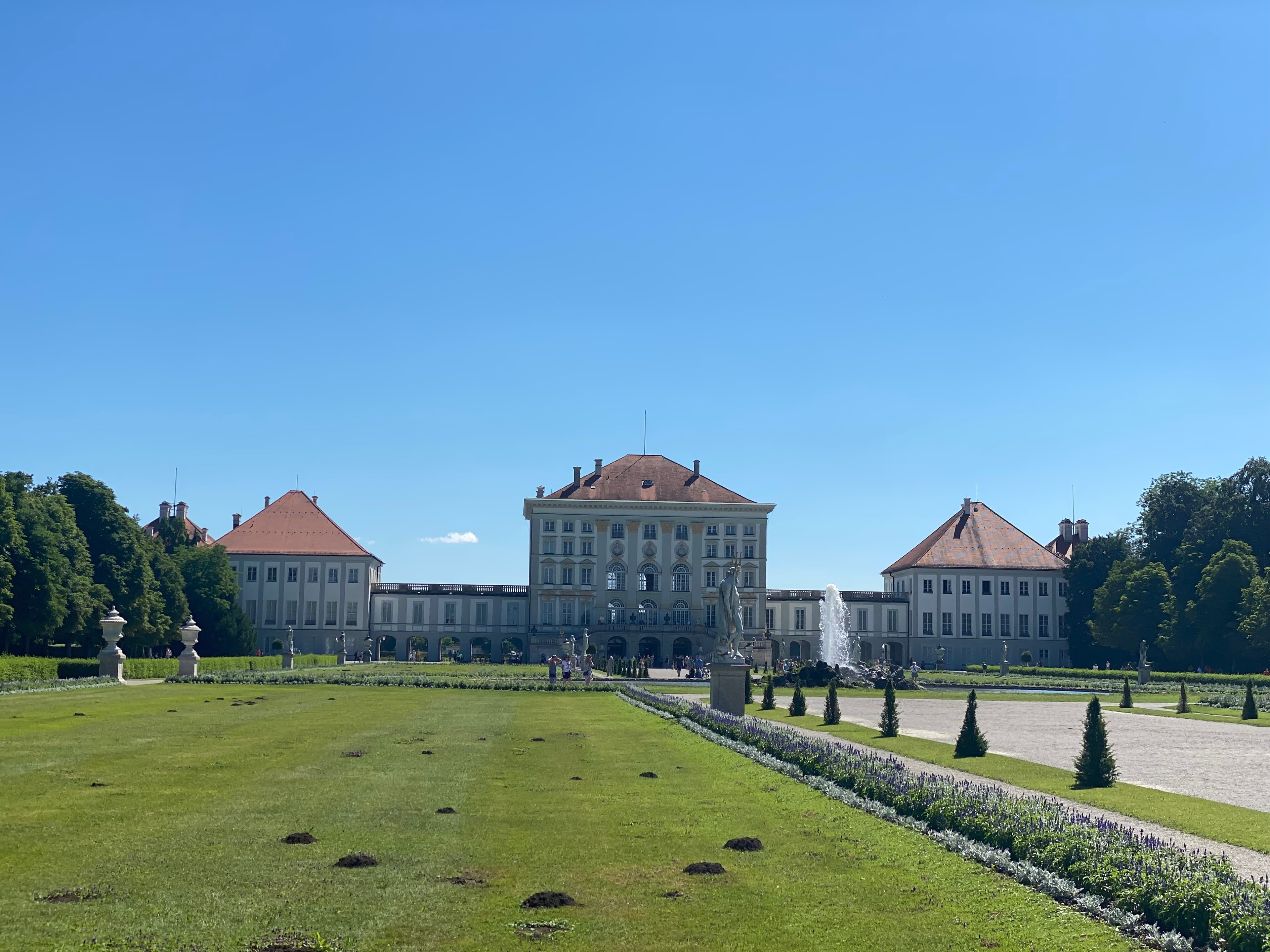 View of Nymphenburg Palace with the gorgeous open gardens and a lovely walking path