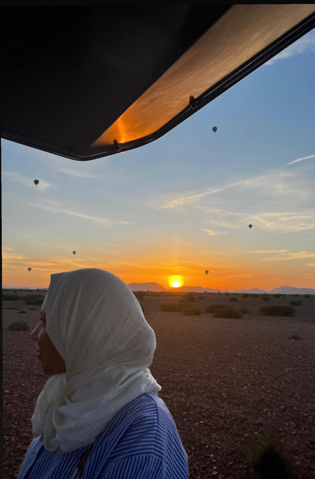Travel advisor posing during sunset