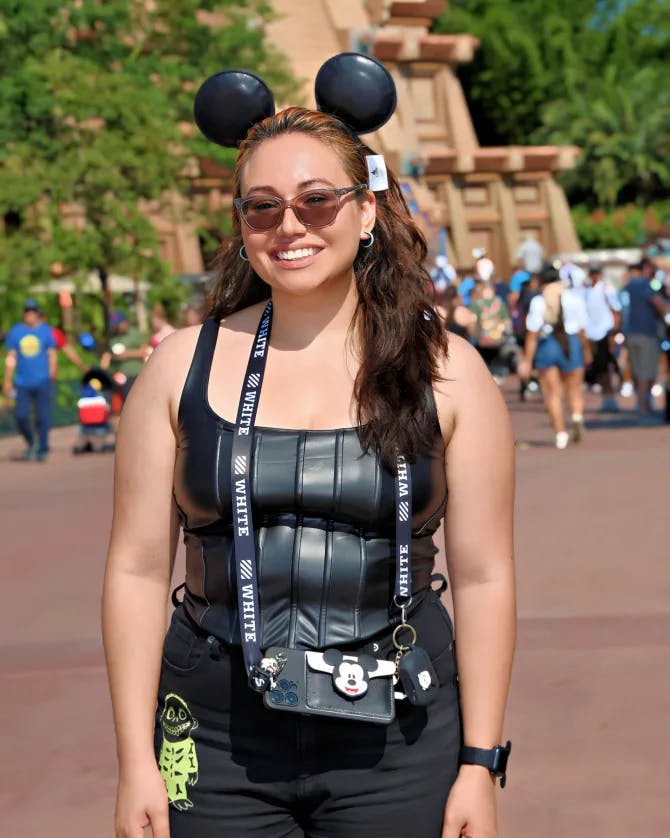 Posing for a picture in Disney Land