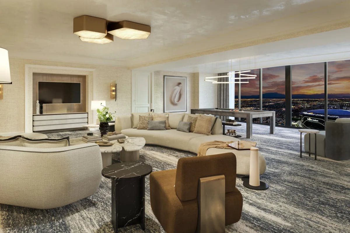 An expansive common space with an excellent view of Allegiant Stadium belonging to one of Four Seasons' Vegas hotels' top suites.