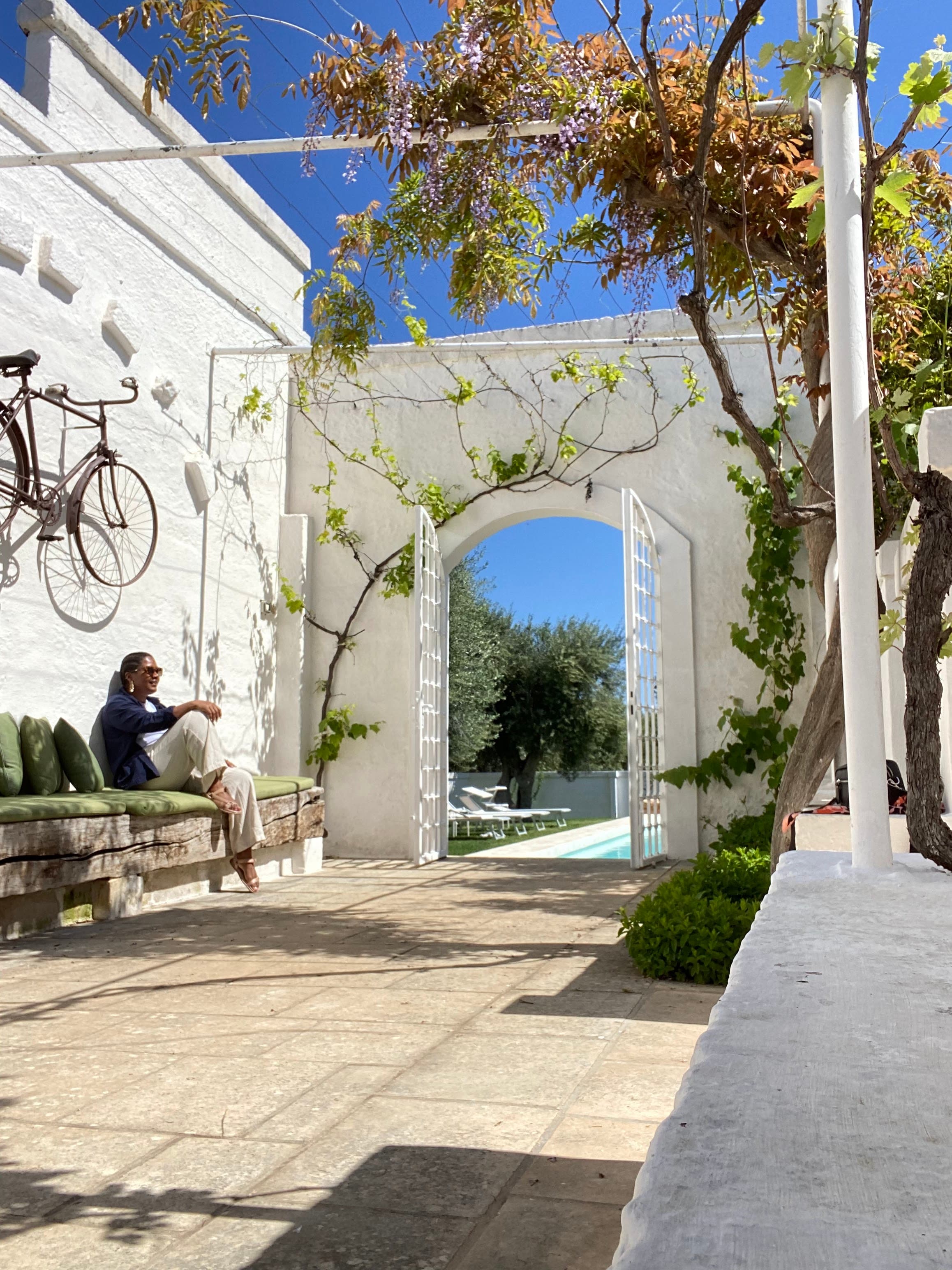 A girl sitting in Greece.