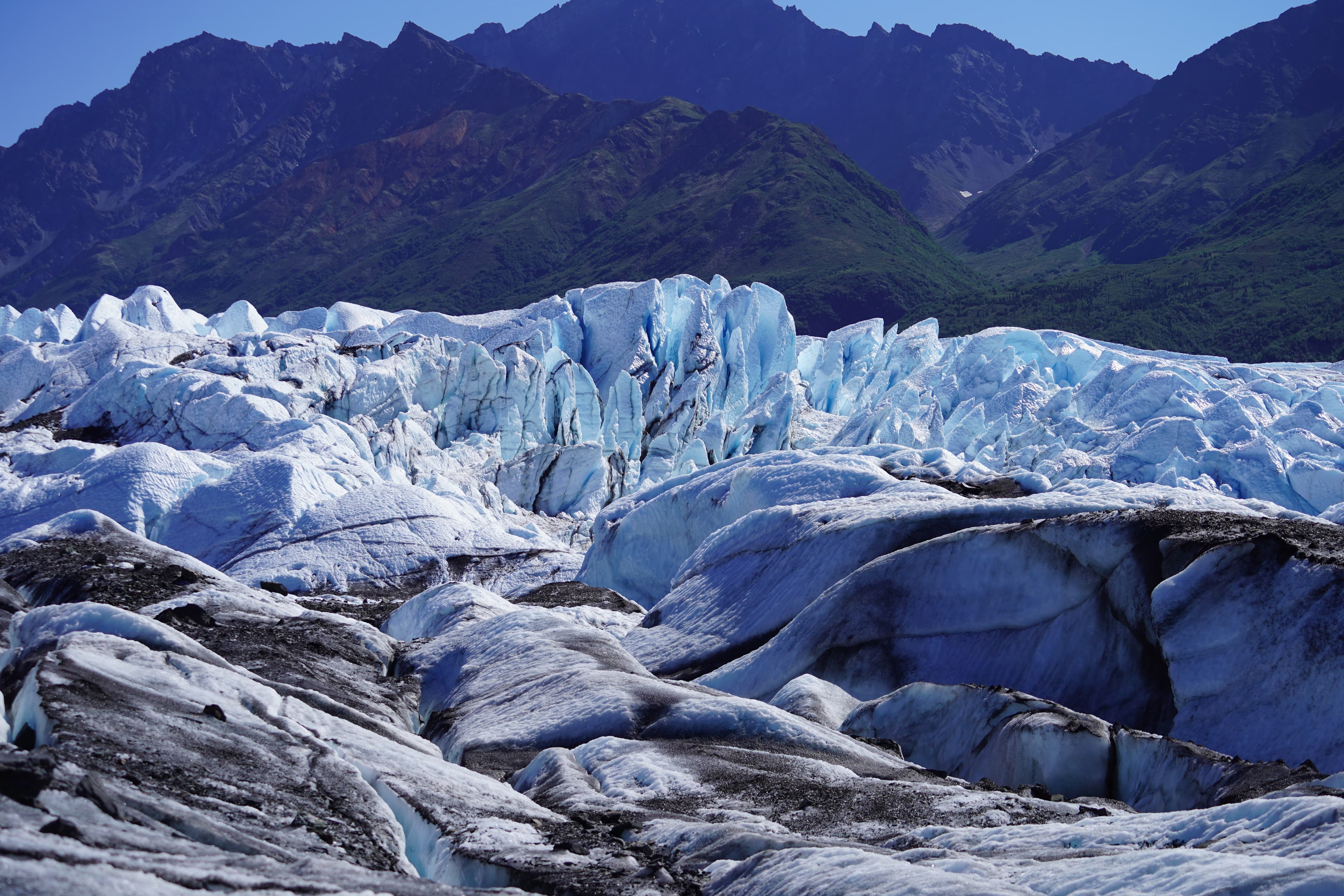 Glacier formations in front of a mountain view