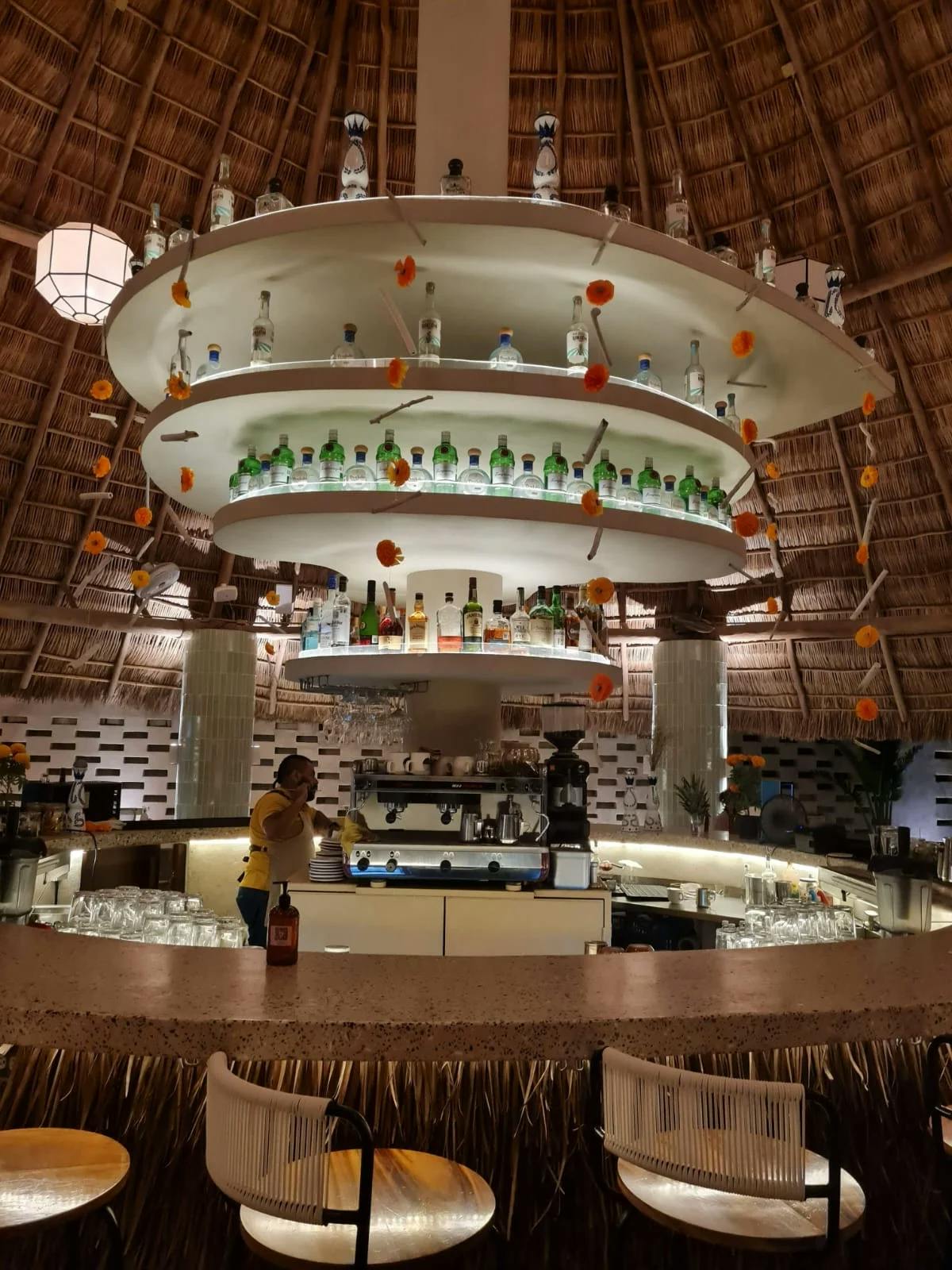 A round bar in an indoor restaurant
