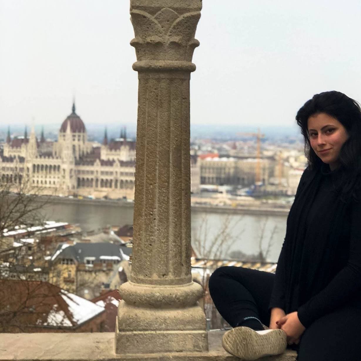 Posing with the Hungarian Parliament Building in the background