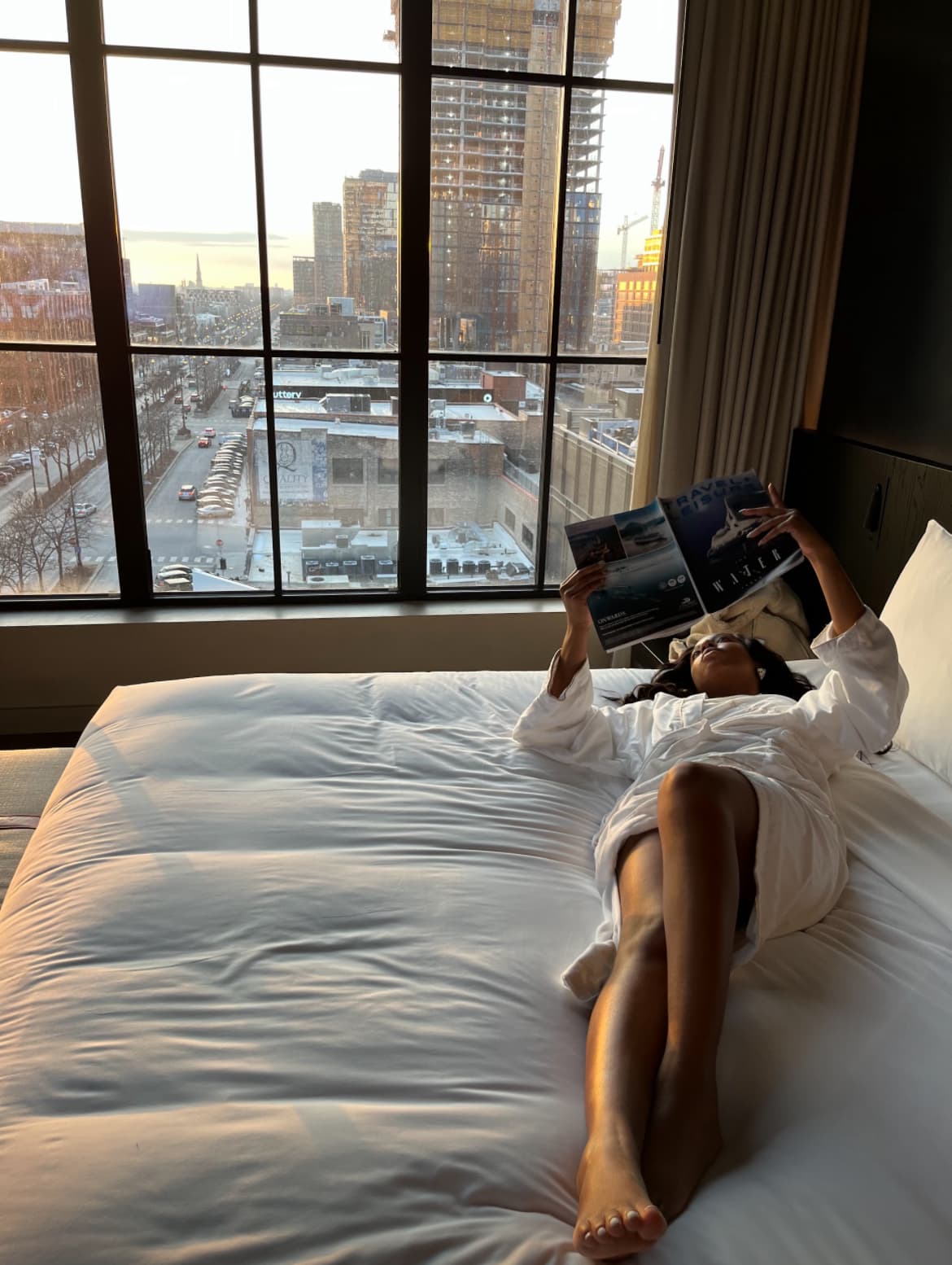 reading book on bed
