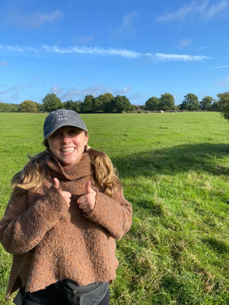 Picture of Alexis in brown sweater