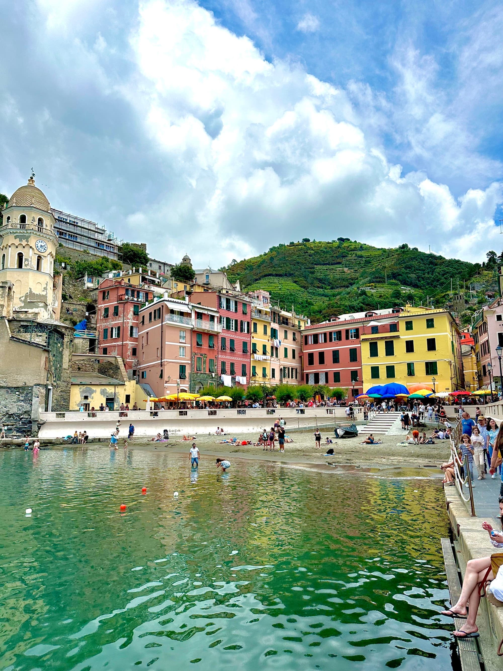 colorful old buildings and populated beach