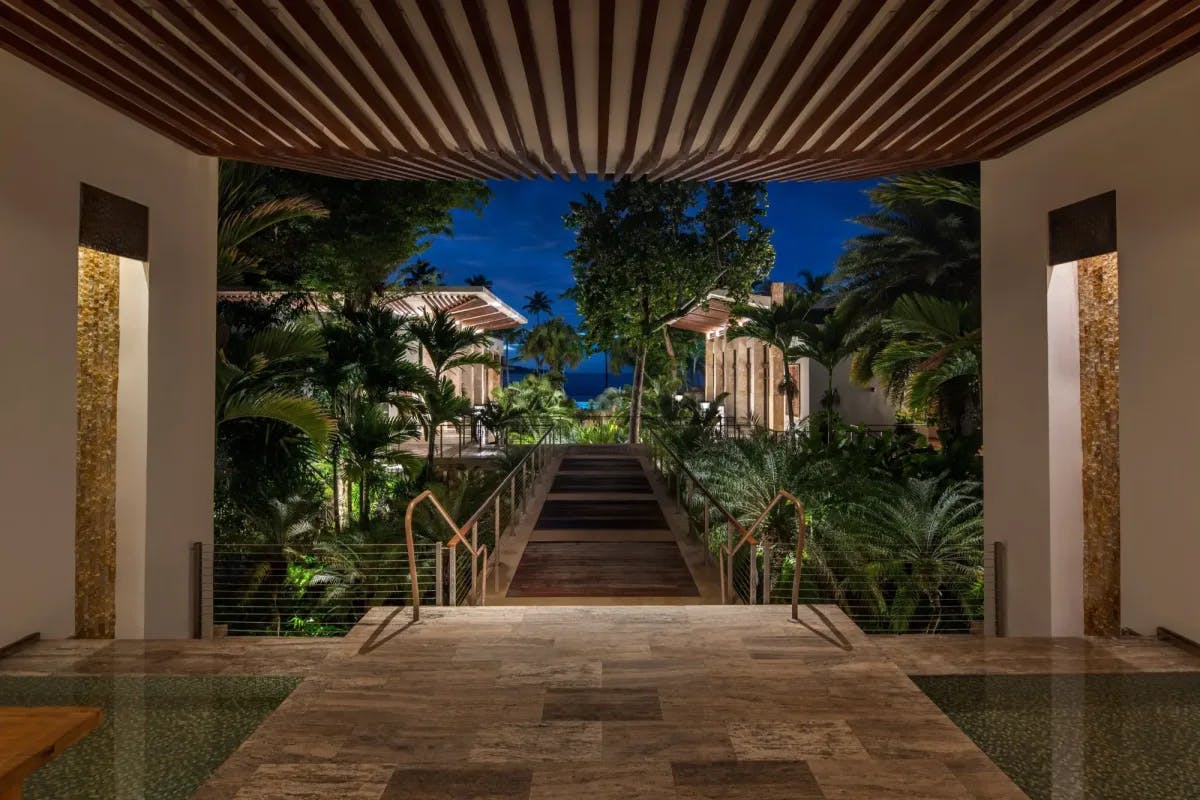 Lush, manicured gardens interrupt ritzy pavilions at Dorado Beach, A Ritz-Carlton Reserve