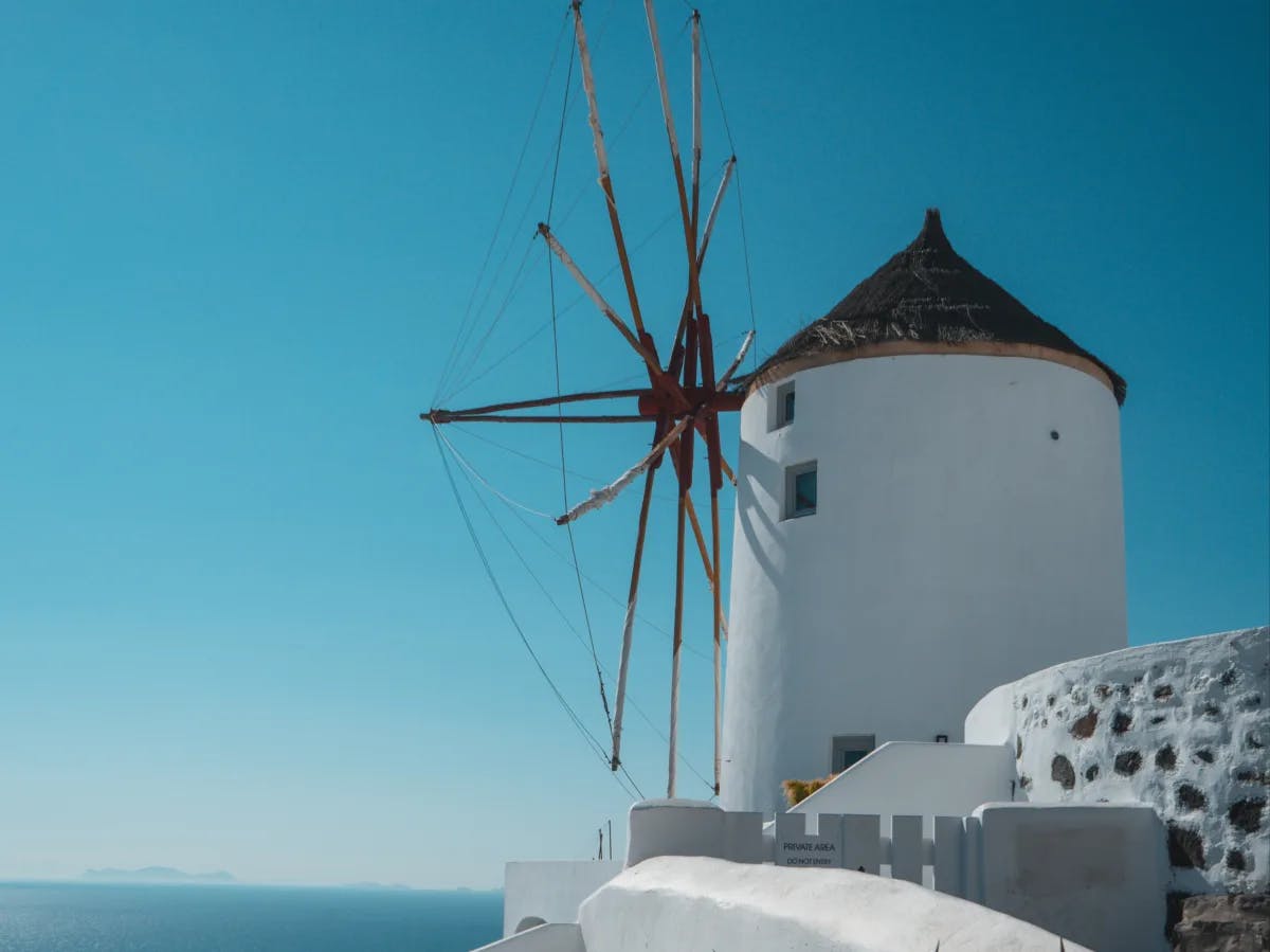 stunning windmill with sea view on a sunny day