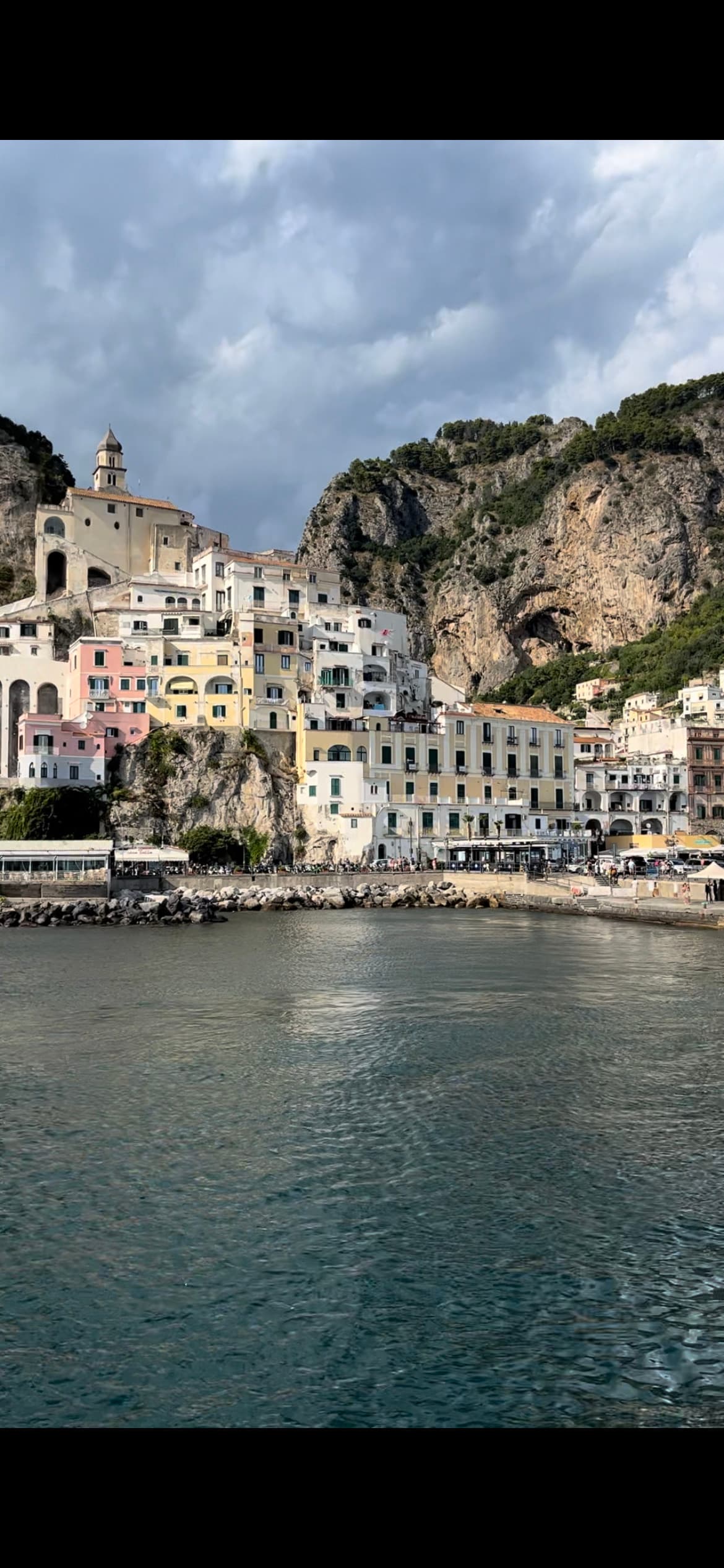 A beautiful view of Amalfi Coast with the water in front