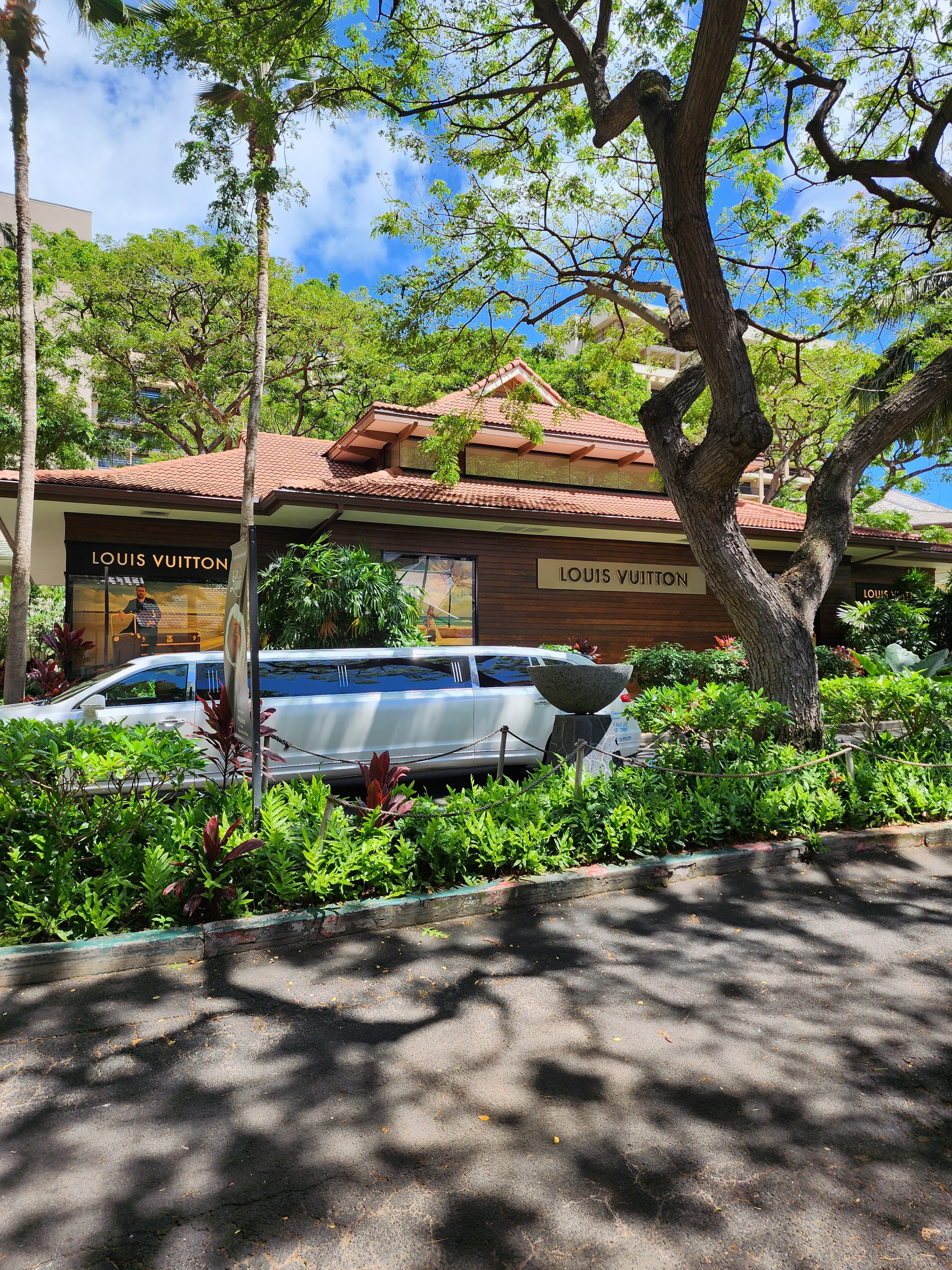 A red brick house and trees view