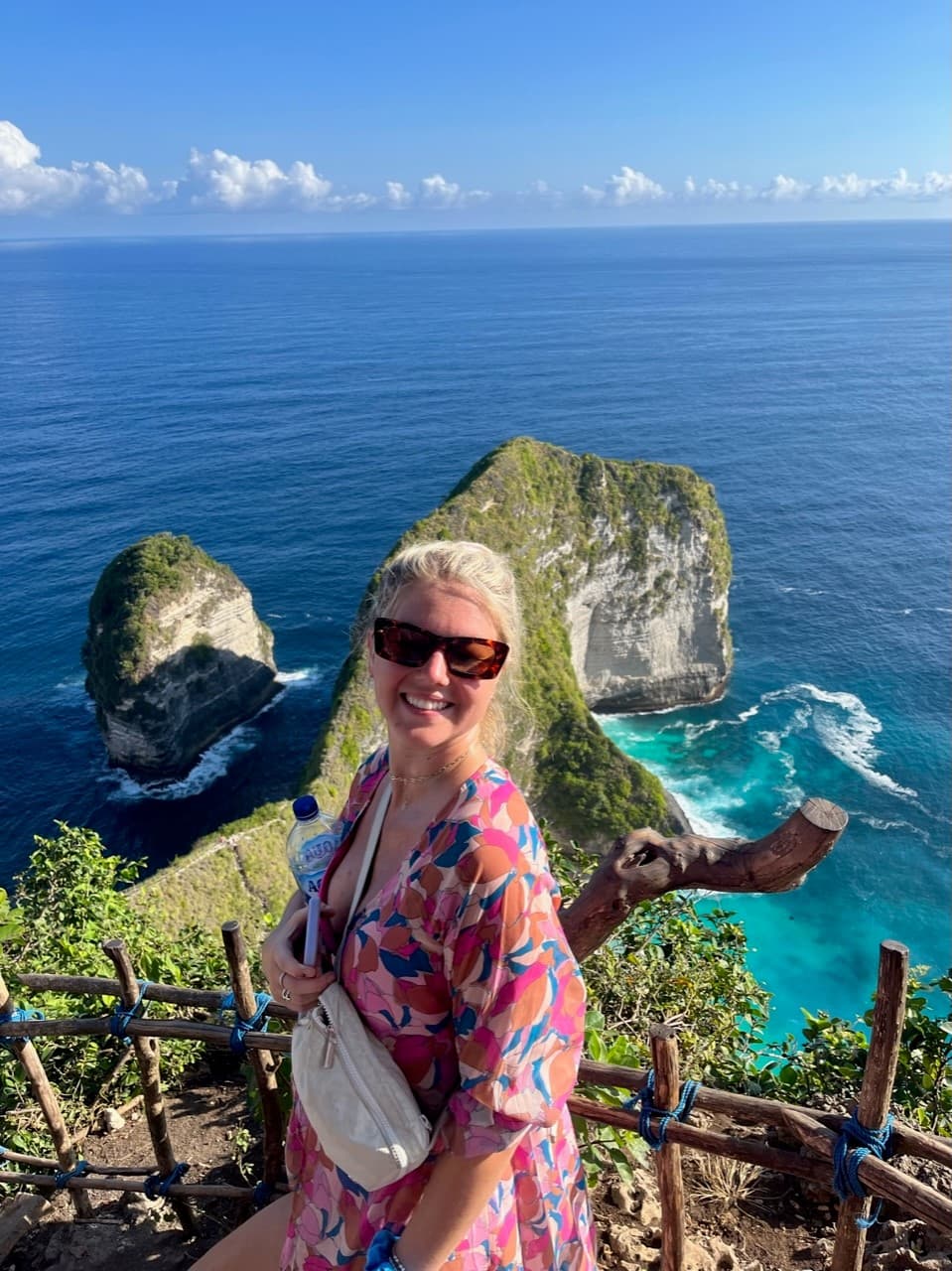 Travel advisor posing on a seaside