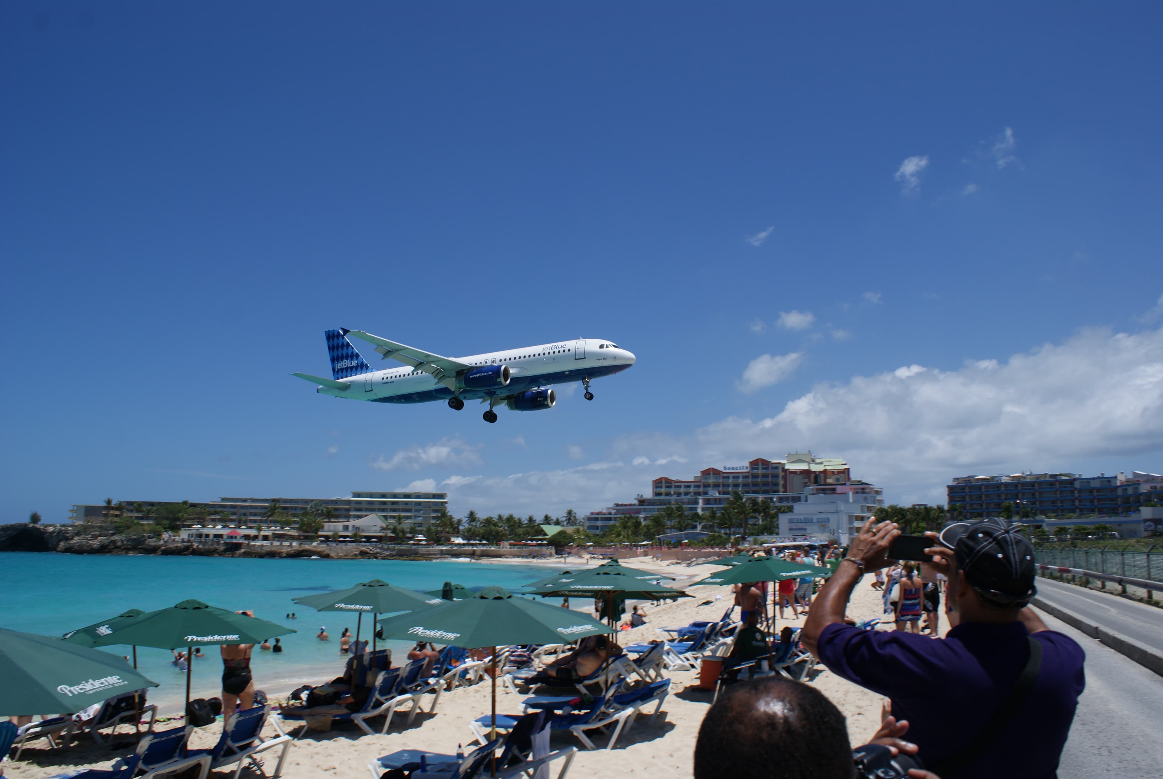 Plane flying very close to the beach