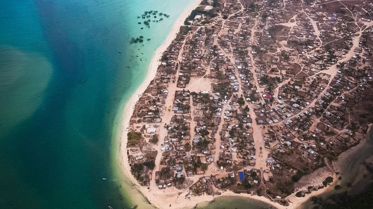 Aerial view of a small town on a beach.
