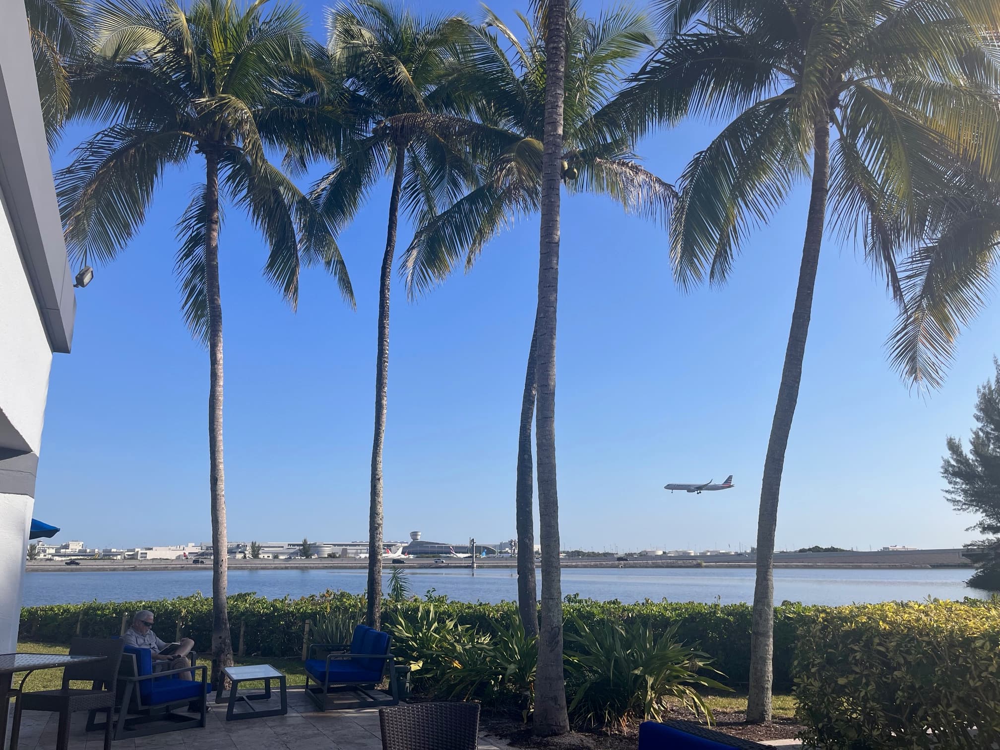 Plane landing on an airport by the coast