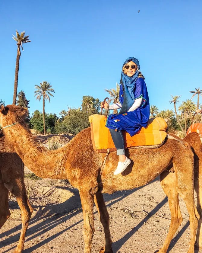 Travel advisor riding on a camel