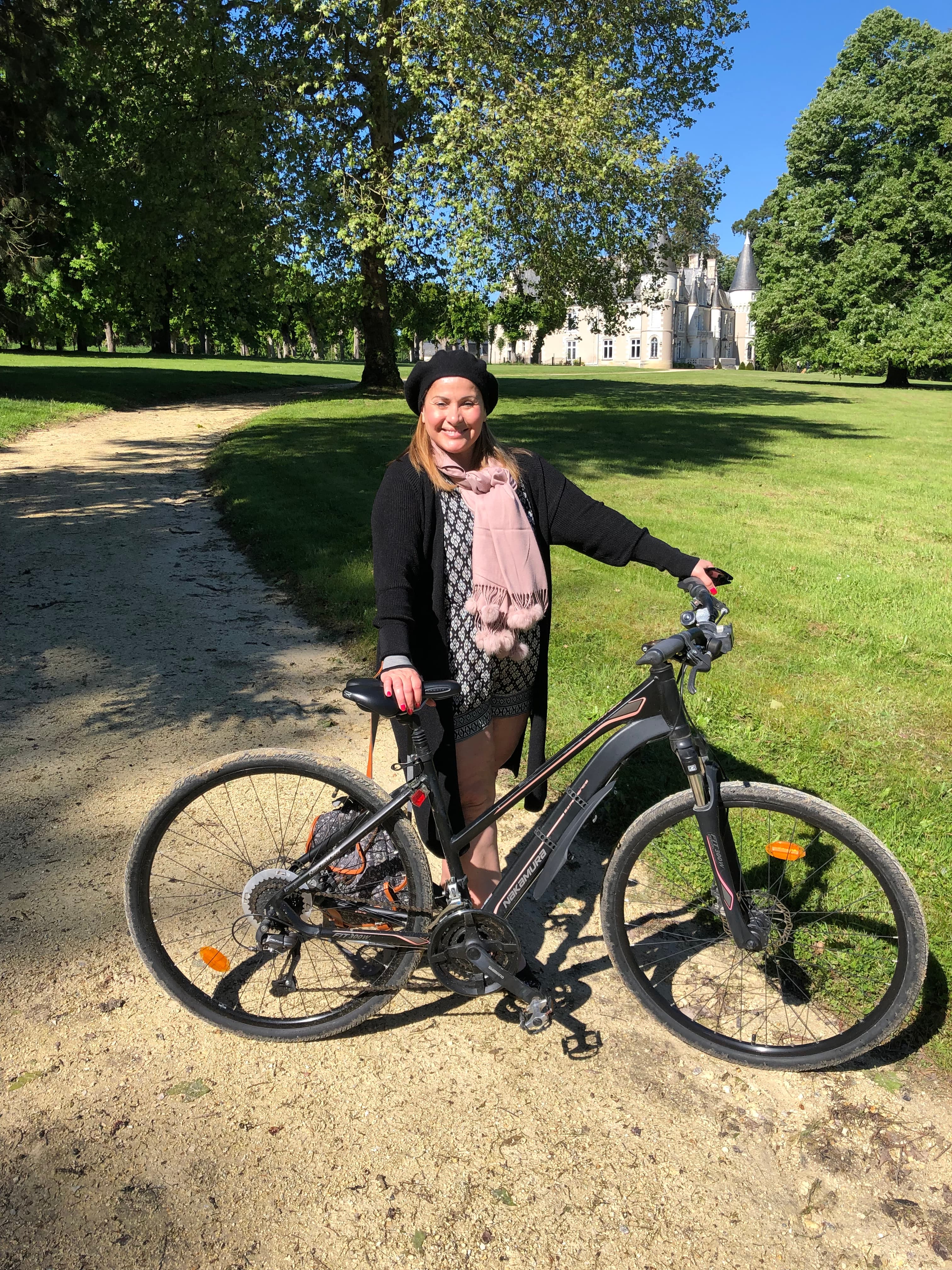 Travel advisor holding a bicycle