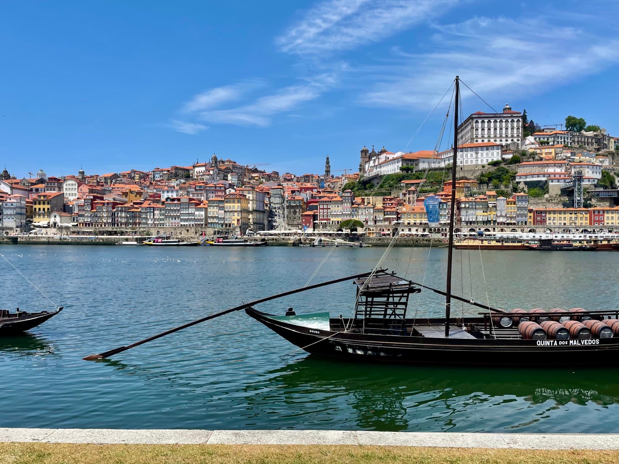 colorful town on a canal with large row boat