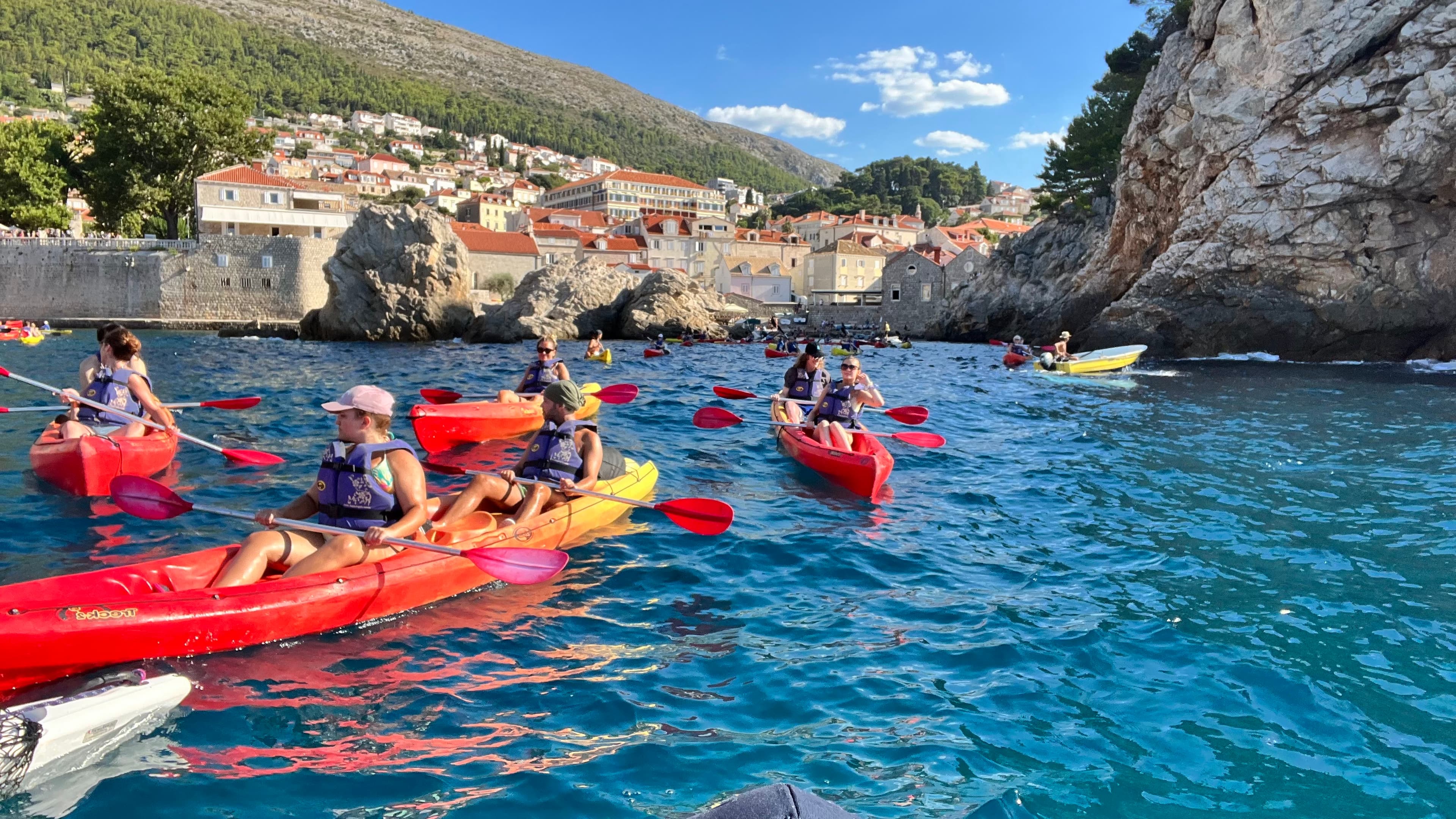 A picture of people sailing.