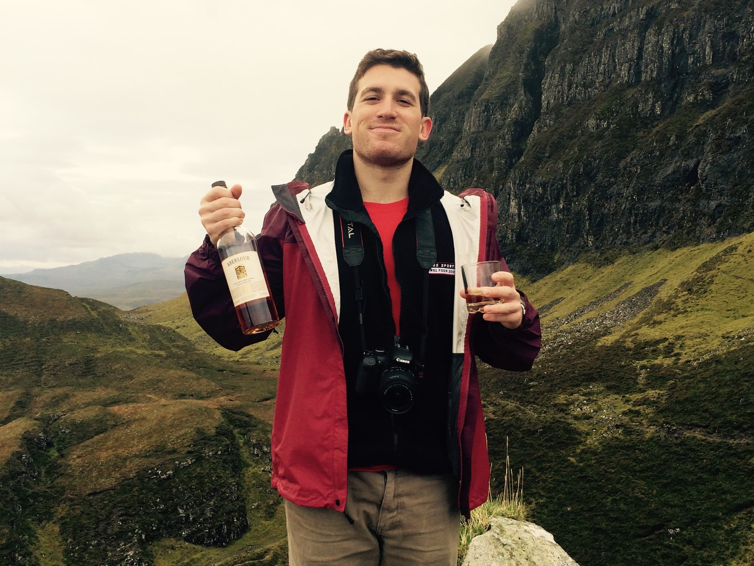 Boy with the wine in the nature