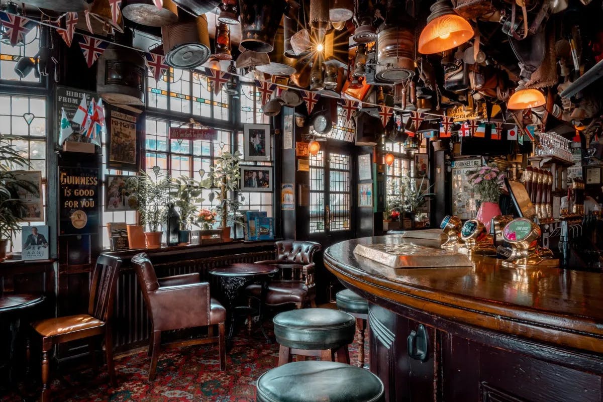 The Churchill Arms in Kensington is a beloved and unique London pub, known for its charming floral exterior and excellent traditional British food.
