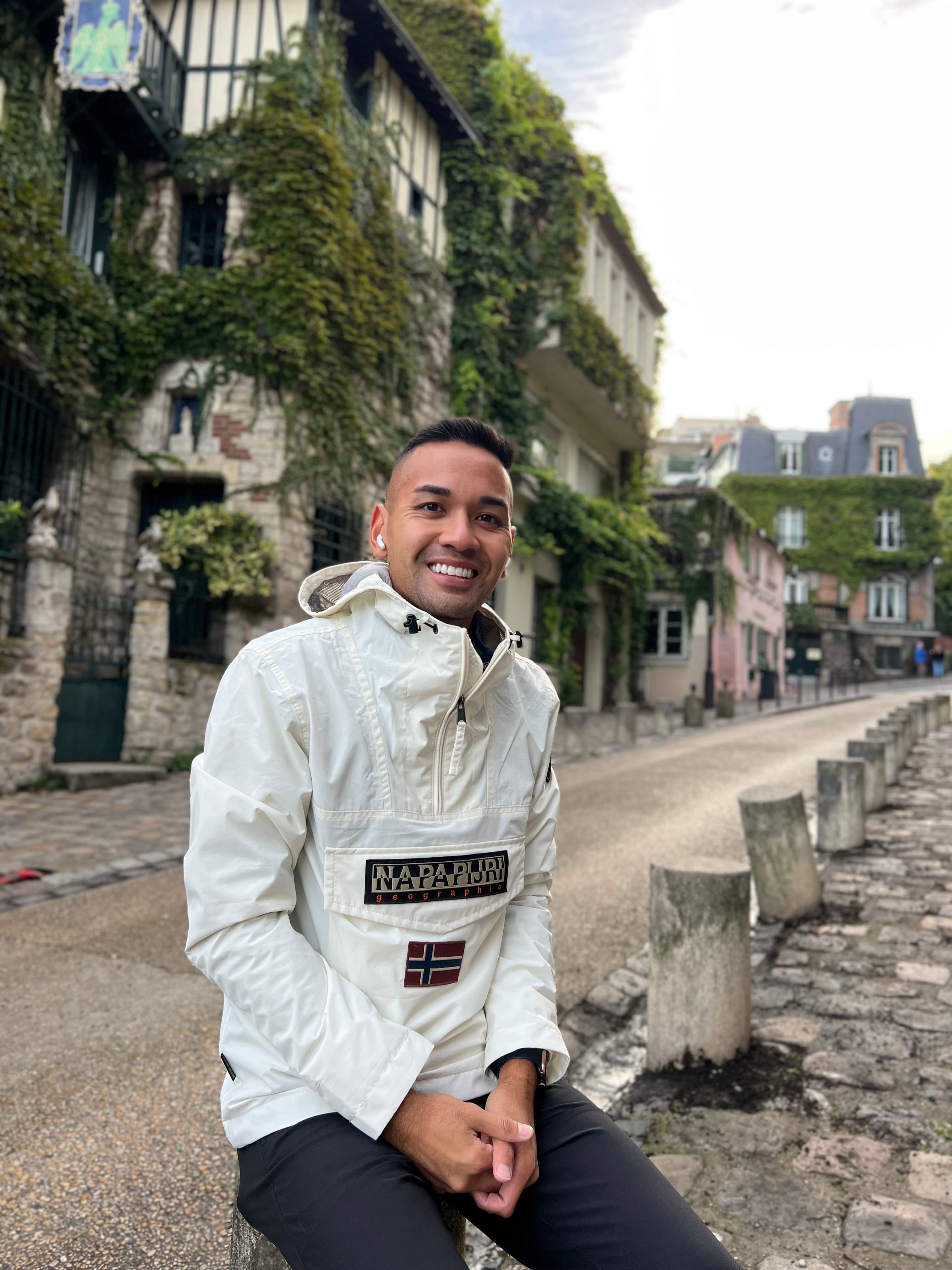 Picture of Luan sitting on stone