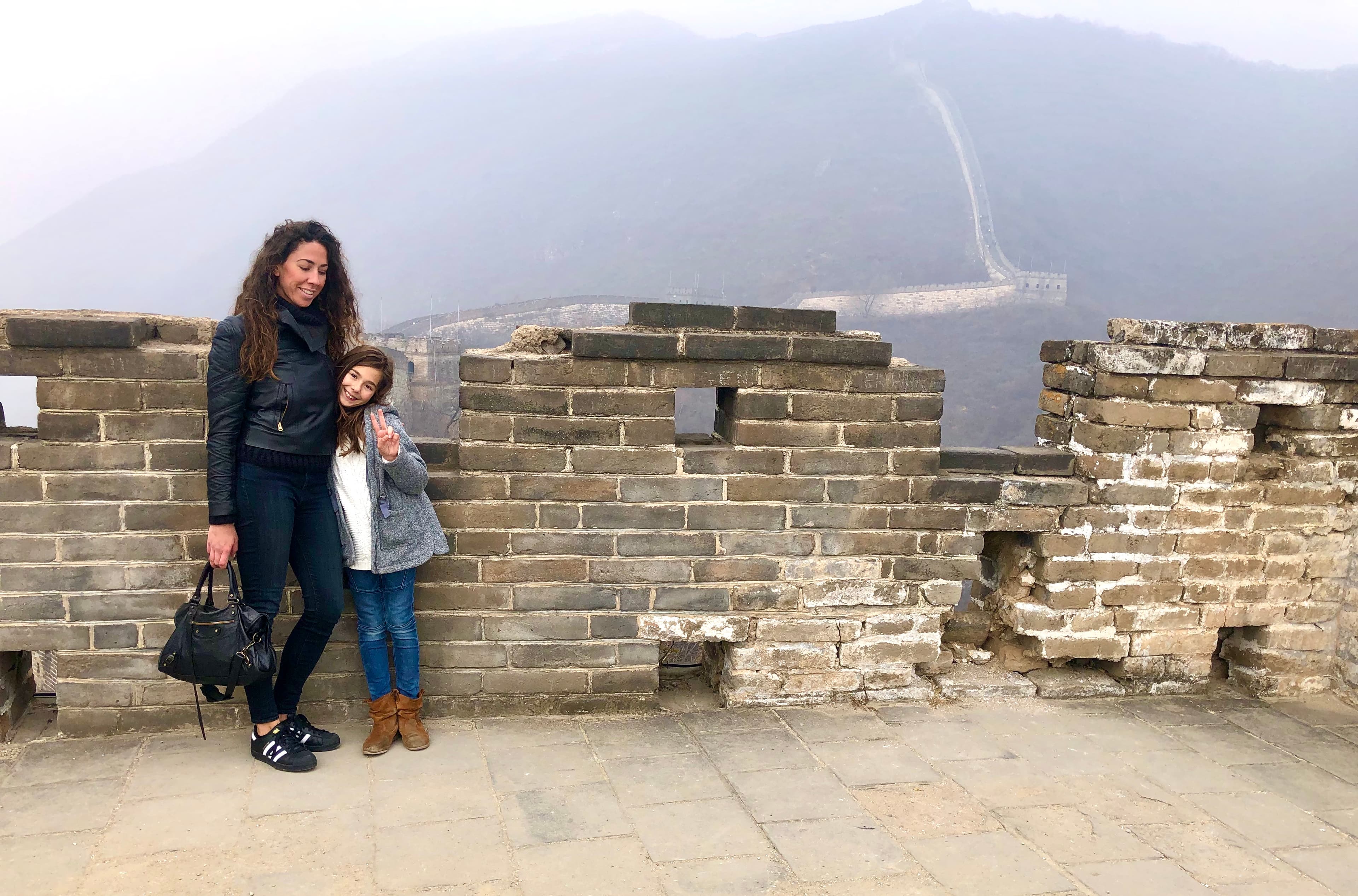 Travel advisor posing with a kid