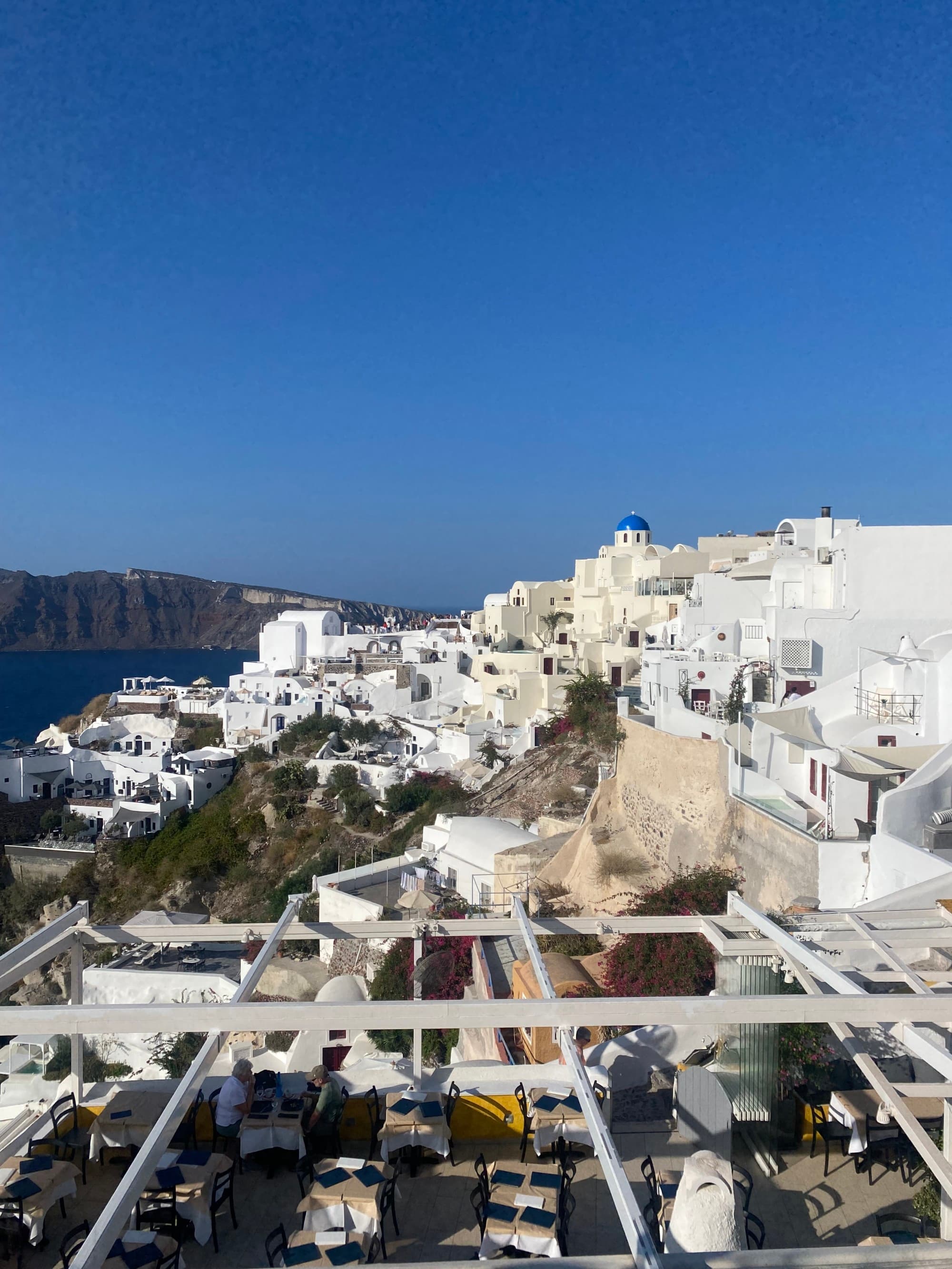 Aerial view of white buildings.