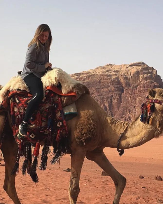 AmryAlexa riding on Camel's back