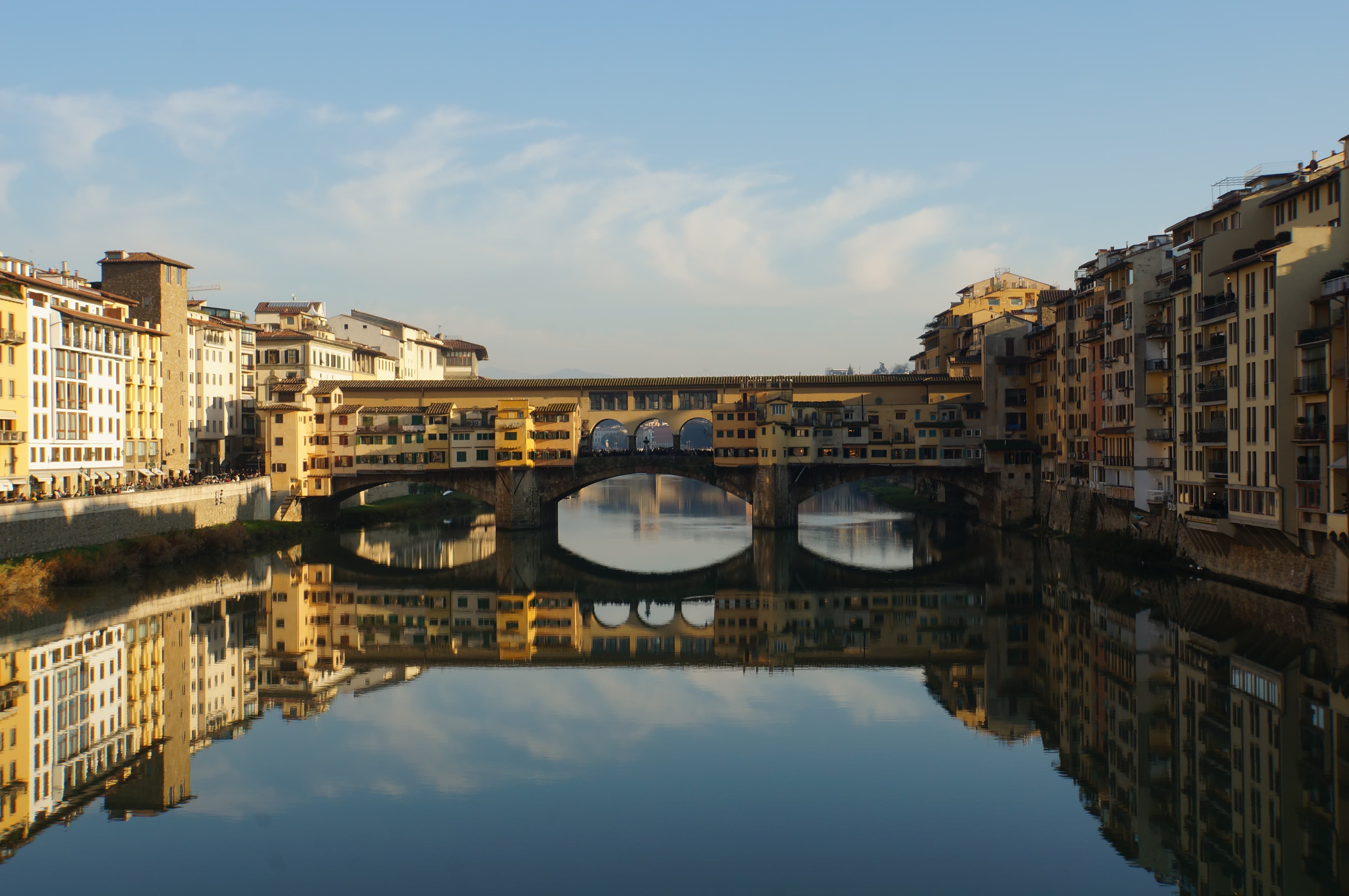 A historic building surrounding the river