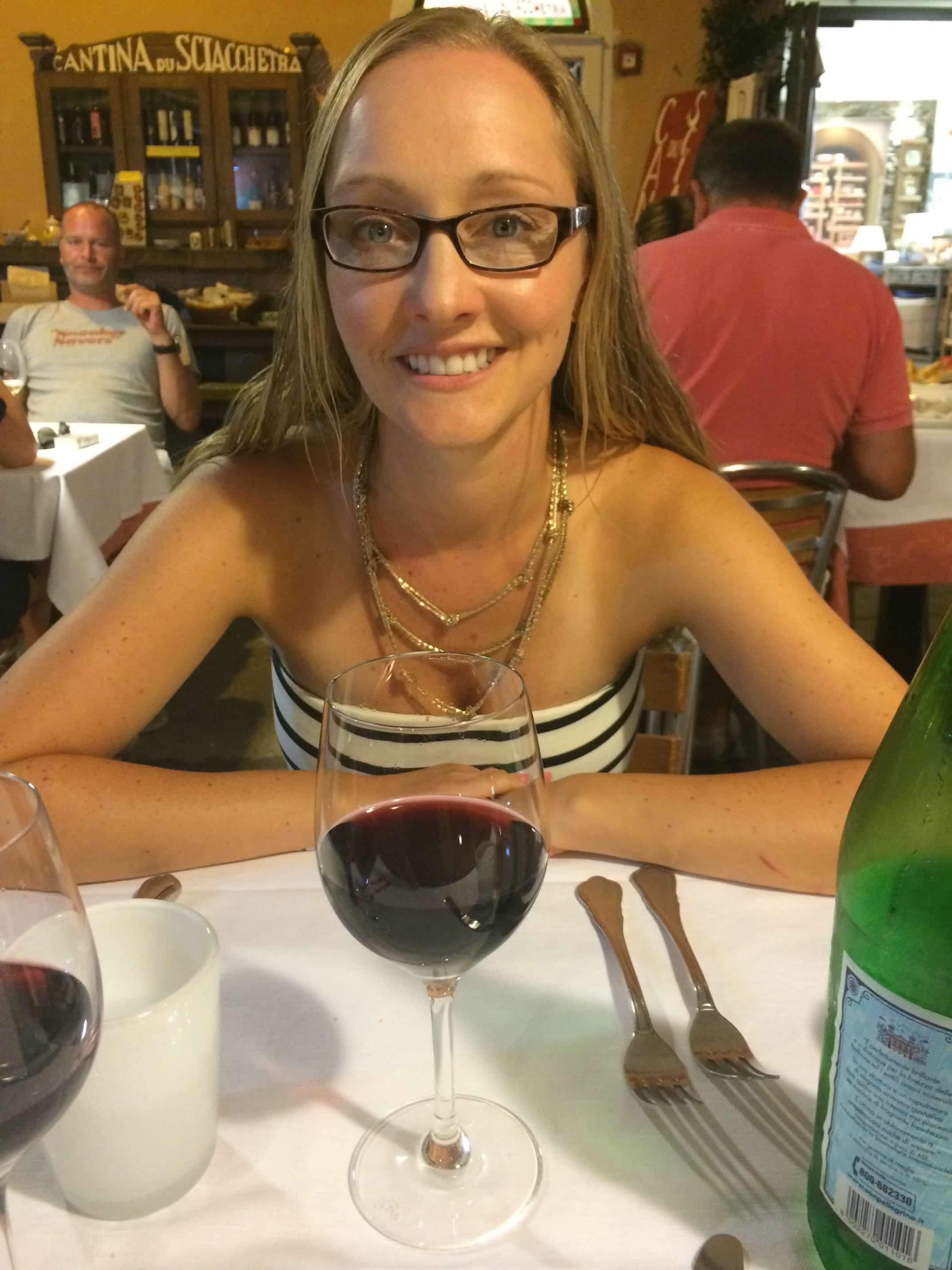 Picture of Lauren sitting in aPicture of Lauren sitting in a restaurant